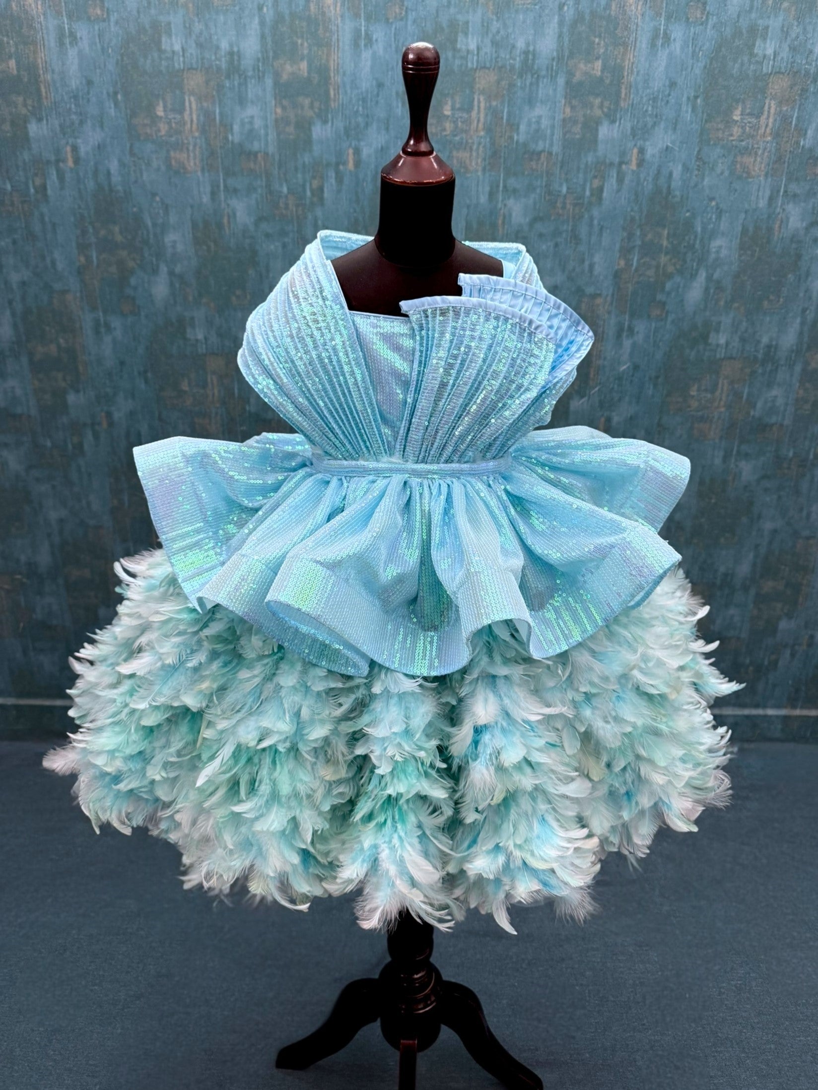 Turquoise feather structure ball with detachable sequin skirt