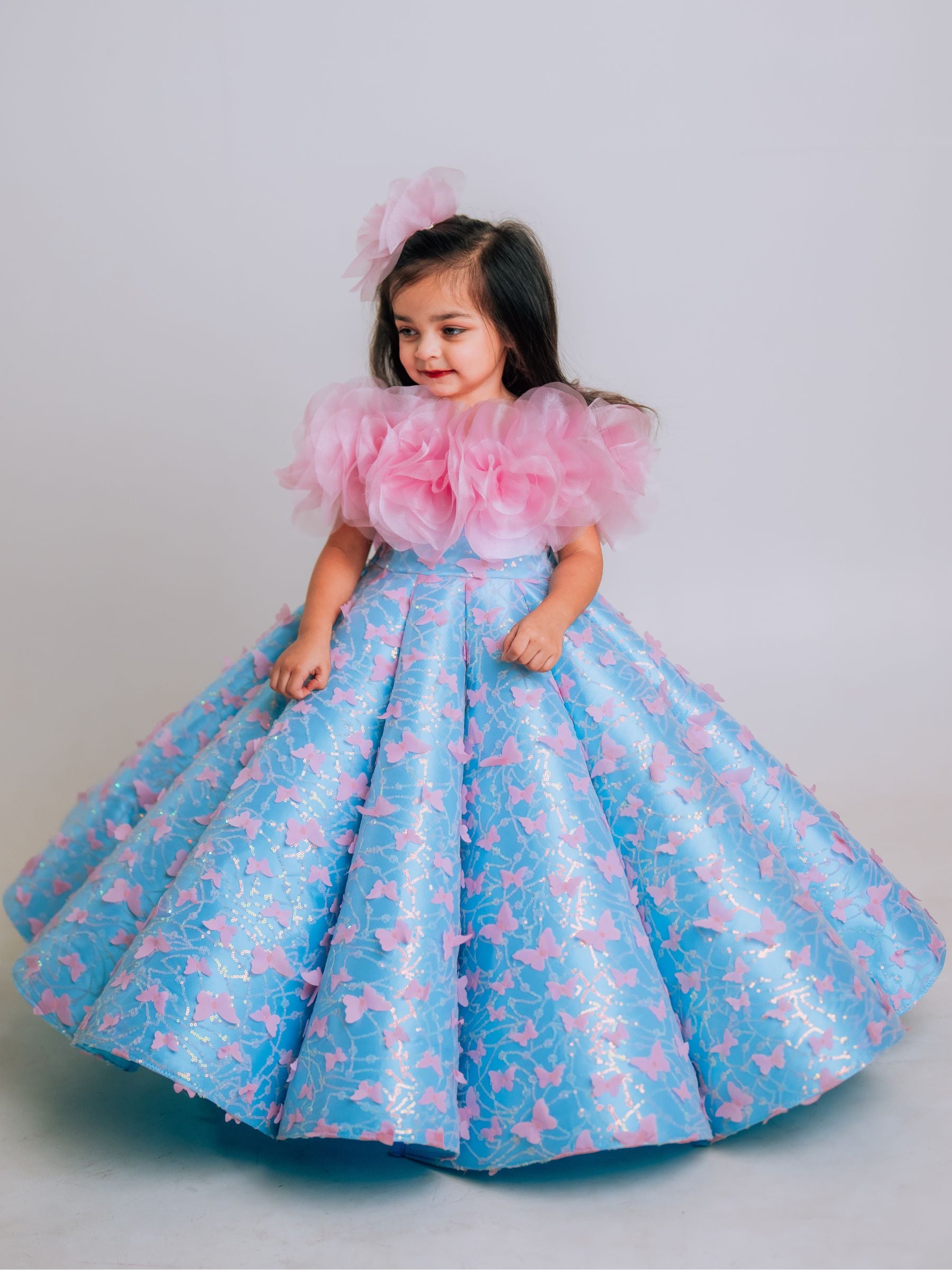 BUTTERFLY AND 3D FLORAL STRUCTURED PANEL BALL GOWN