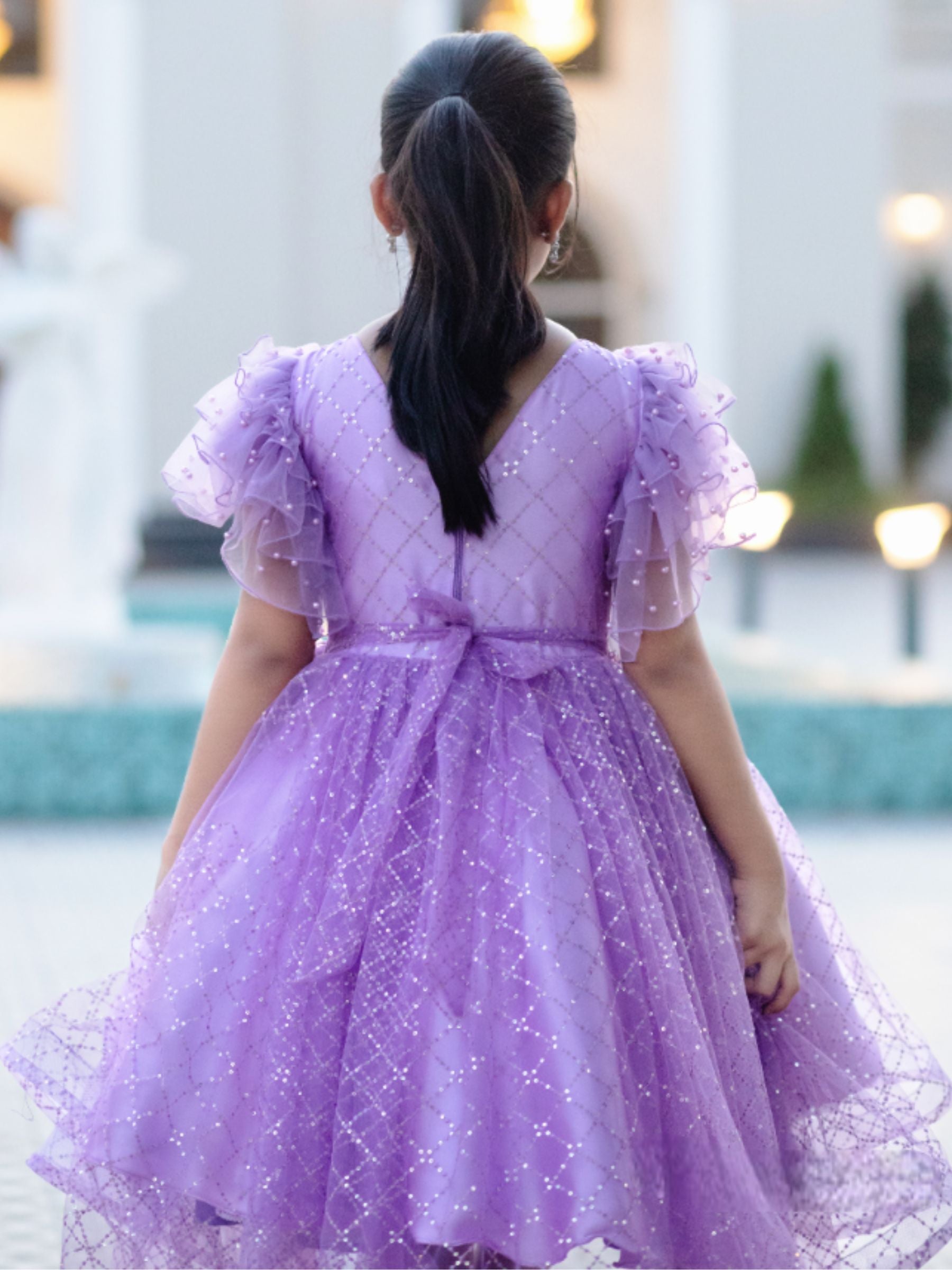 Lavender sequin High low gown with ruffle sleeves