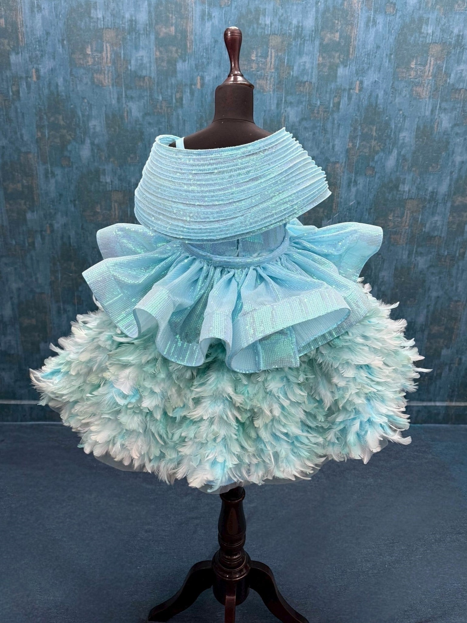 Turquoise feather structure ball with detachable sequin skirt
