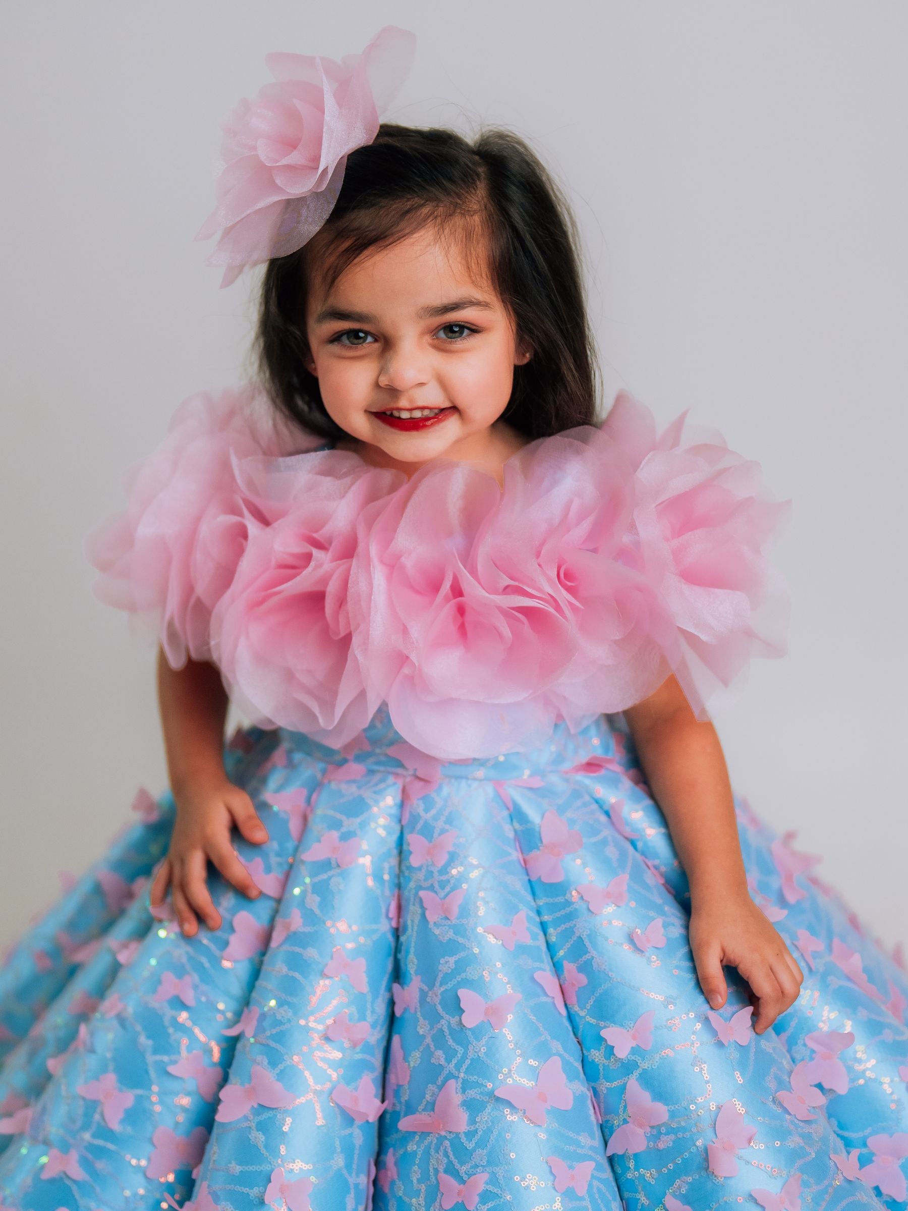 BUTTERFLY AND 3D FLORAL STRUCTURED PANEL BALL GOWN