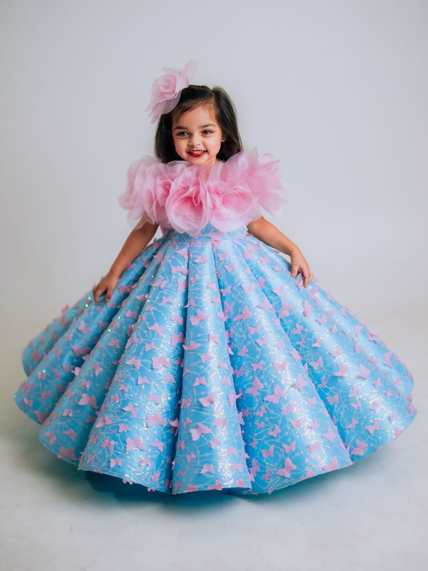 BUTTERFLY AND 3D FLORAL STRUCTURED PANEL BALL GOWN