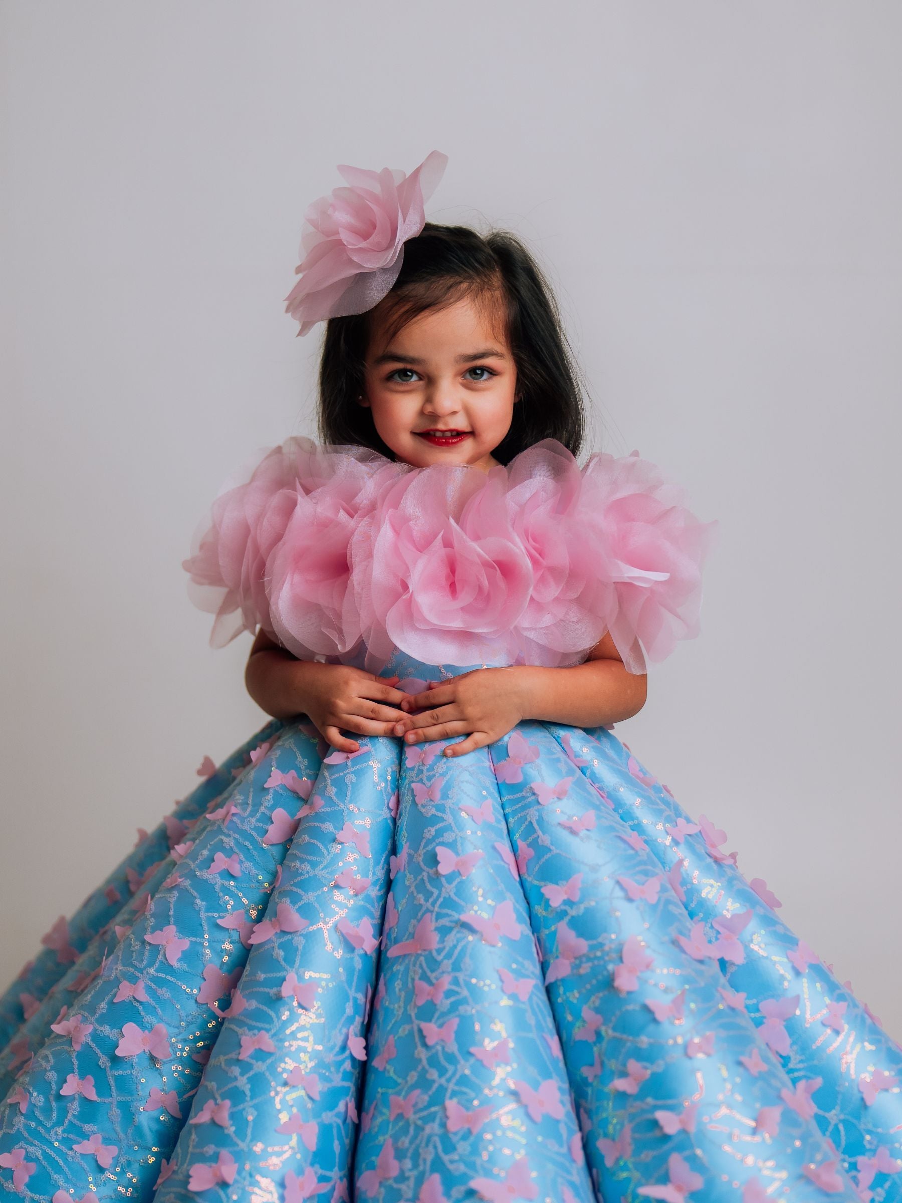 BUTTERFLY AND 3D FLORAL STRUCTURED PANEL BALL GOWN