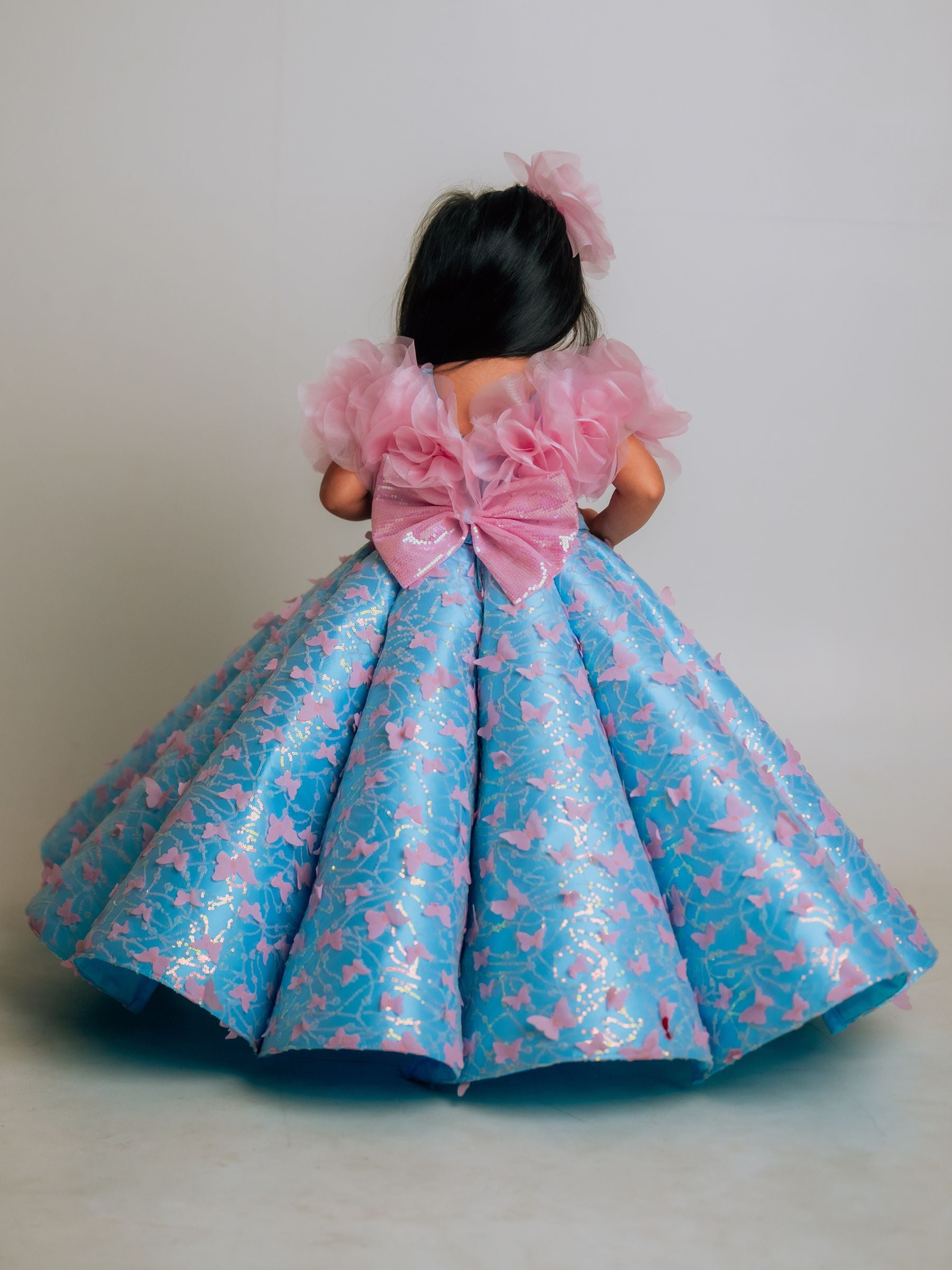 BUTTERFLY AND 3D FLORAL STRUCTURED PANEL BALL GOWN