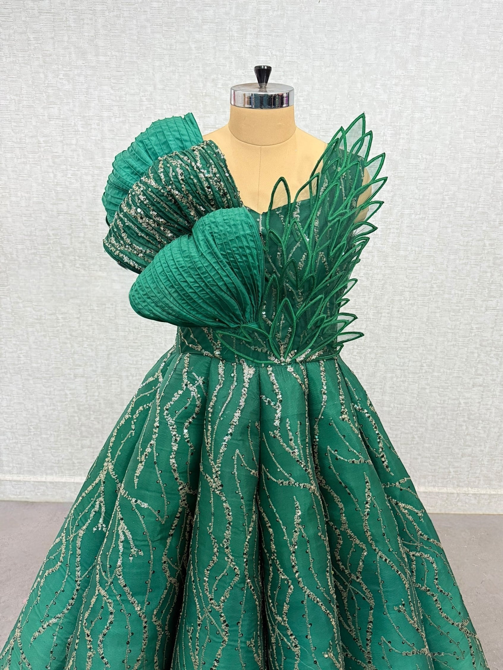 Green Structured Shaded Panel Ball Gown with Embossing Bows and Hand Embroidered Petals