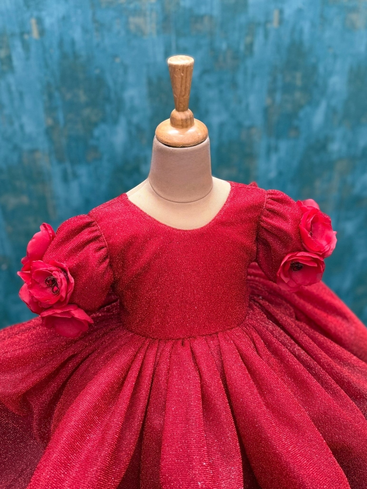 red shimmery floral gown with embossing flowers