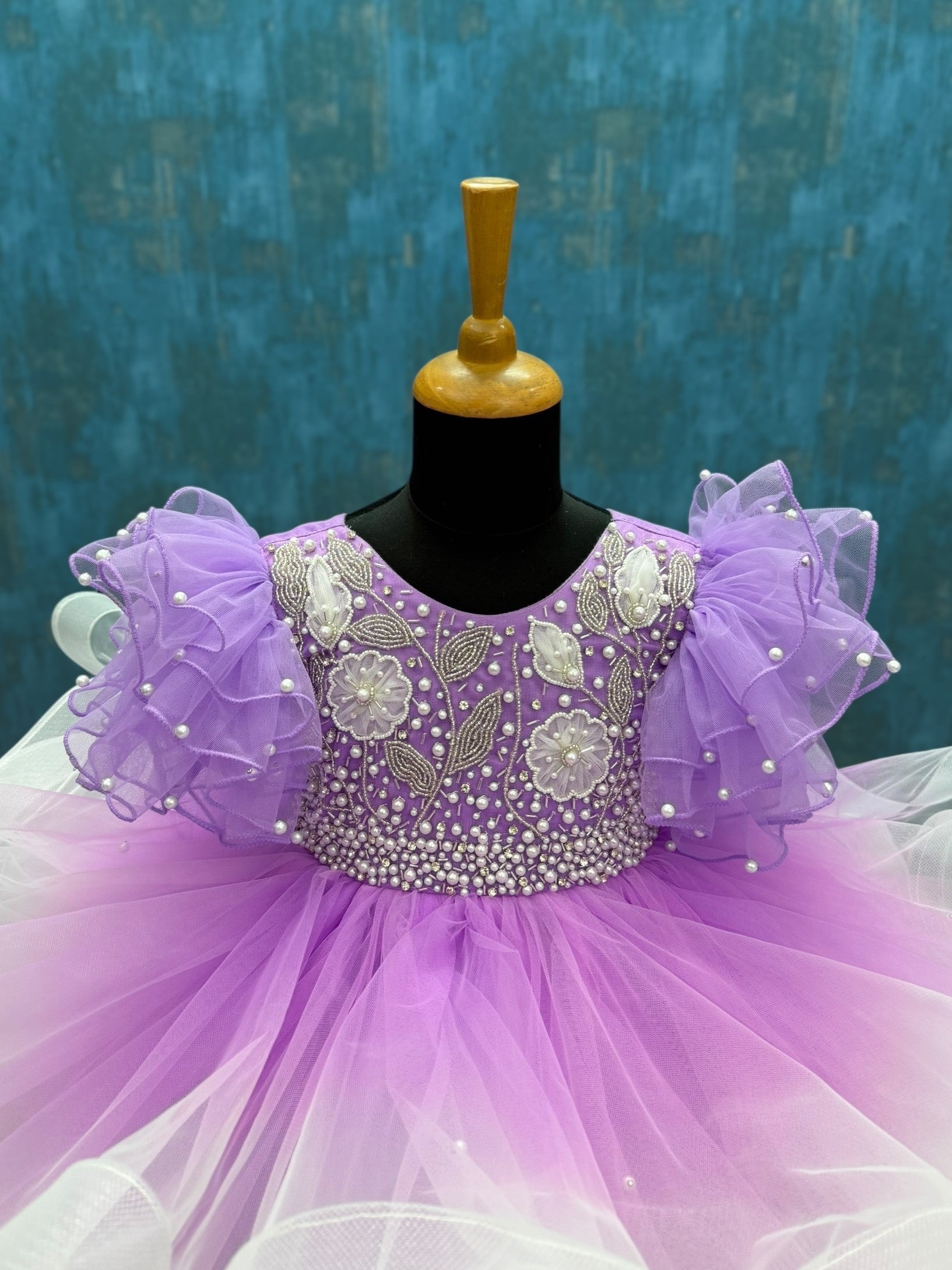 Lavender and white ombré pearl whirl gown with intricate floral embroidery