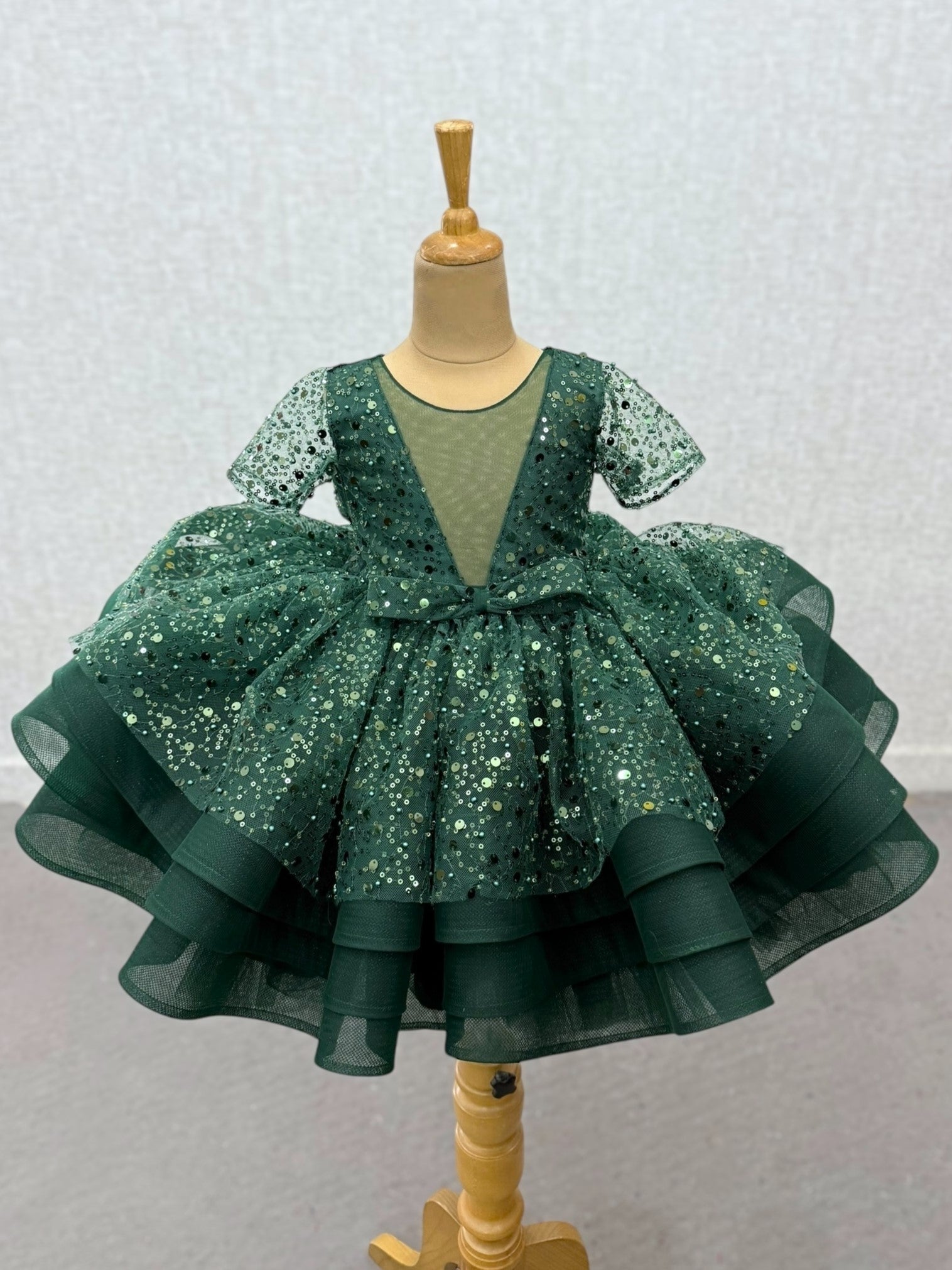 green sequence layer gown with bow