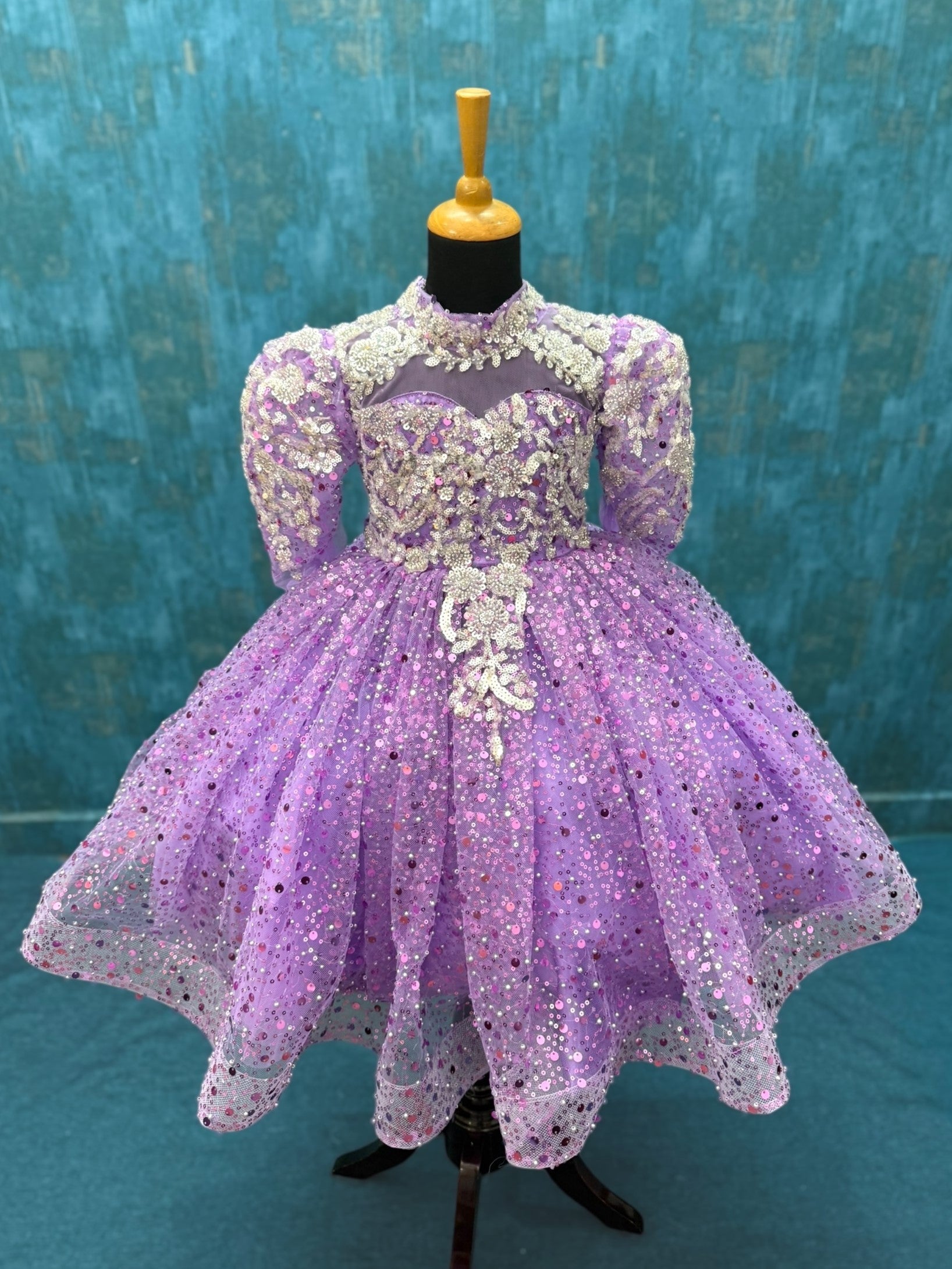 lavender sequence ball gown with high neck and puff sleeves with silver intricate work