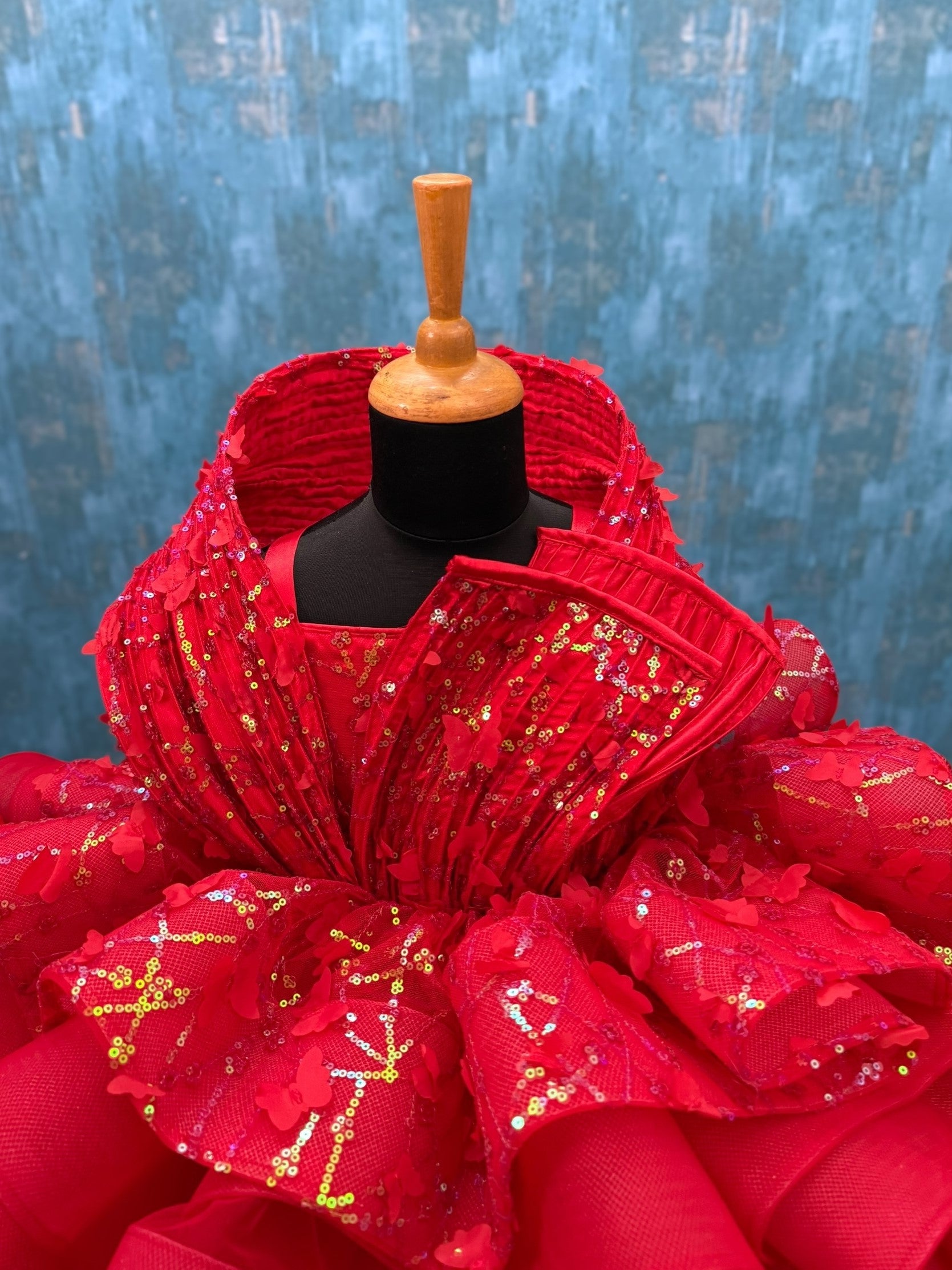 red layer butterfly gown with structured top