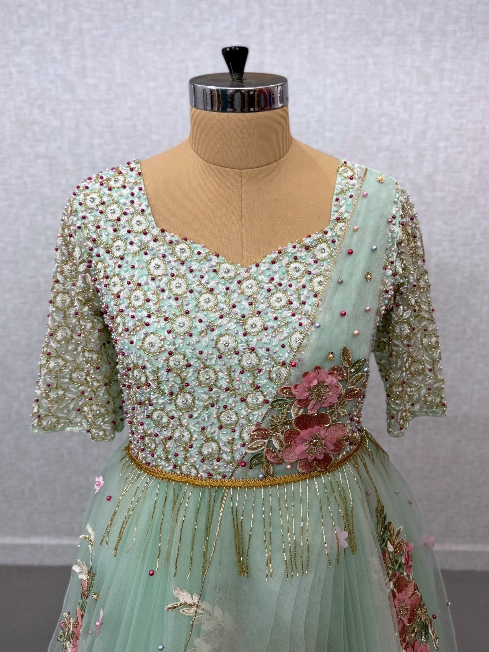 Floral gown with intricate work with attached draped dupatta