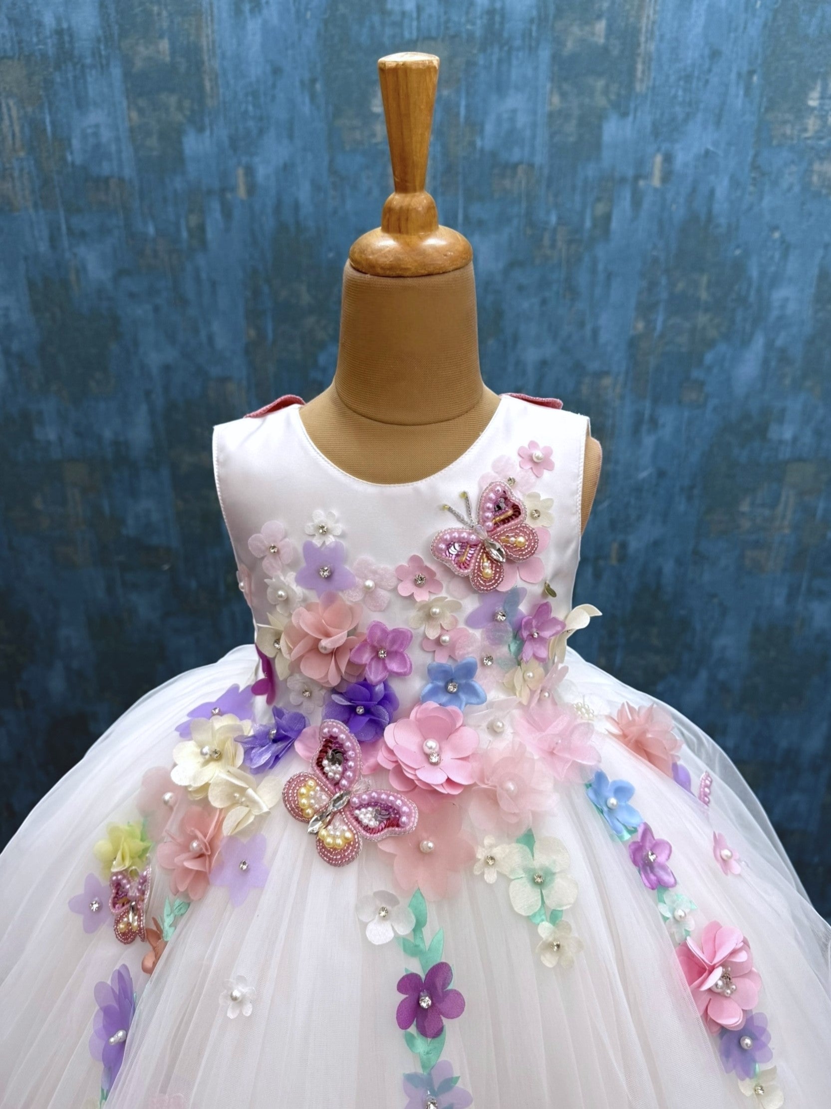 white floral and butterfly ball gown with intricate hand work