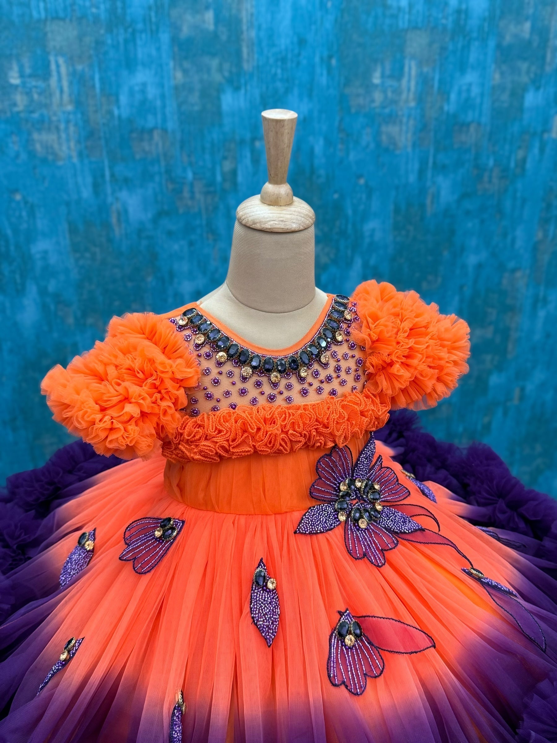 Orange- Purple shaded couture gown with hand crafted flowers