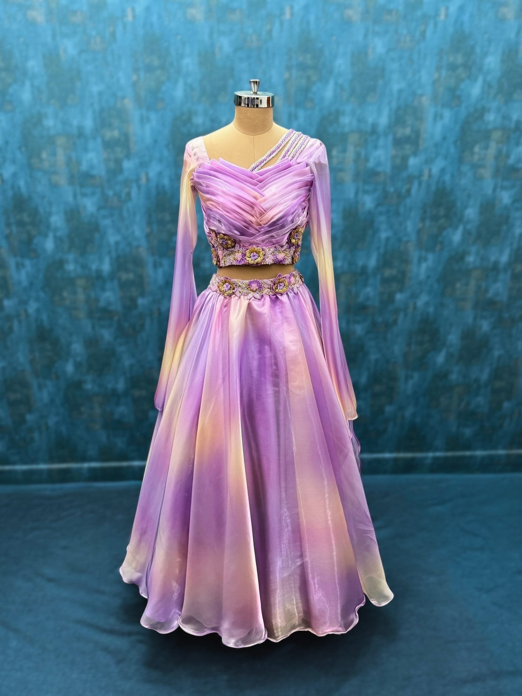 Draped hand embroidered lehenga with flowing sleeves