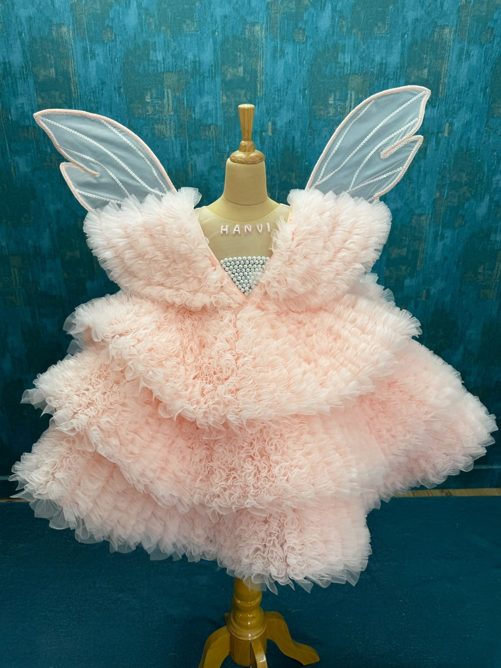 Peach Layer Ruffle Ball Gown With Hand Crafted Wings
