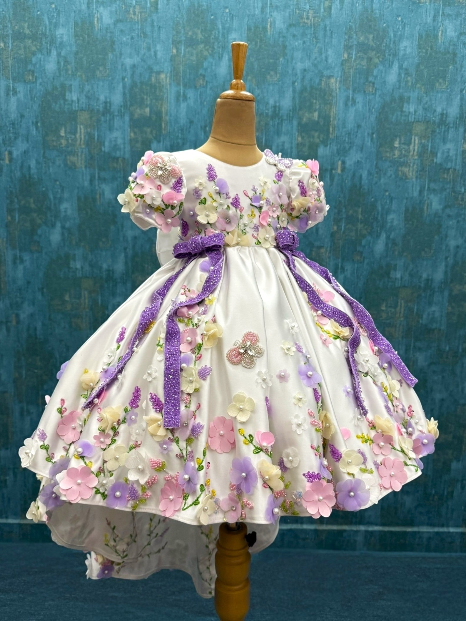 mind blowing white floral ball gown with attached trail with intricate hand work