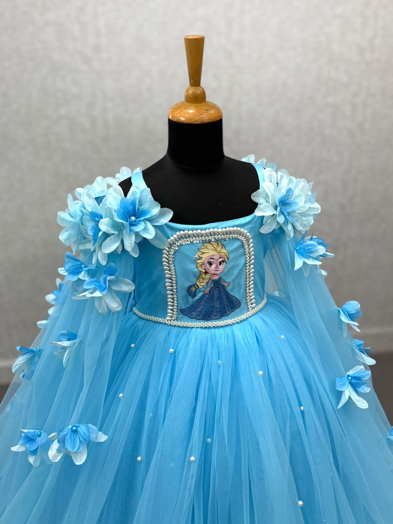 blue frozen elsa bloom gown with floral work