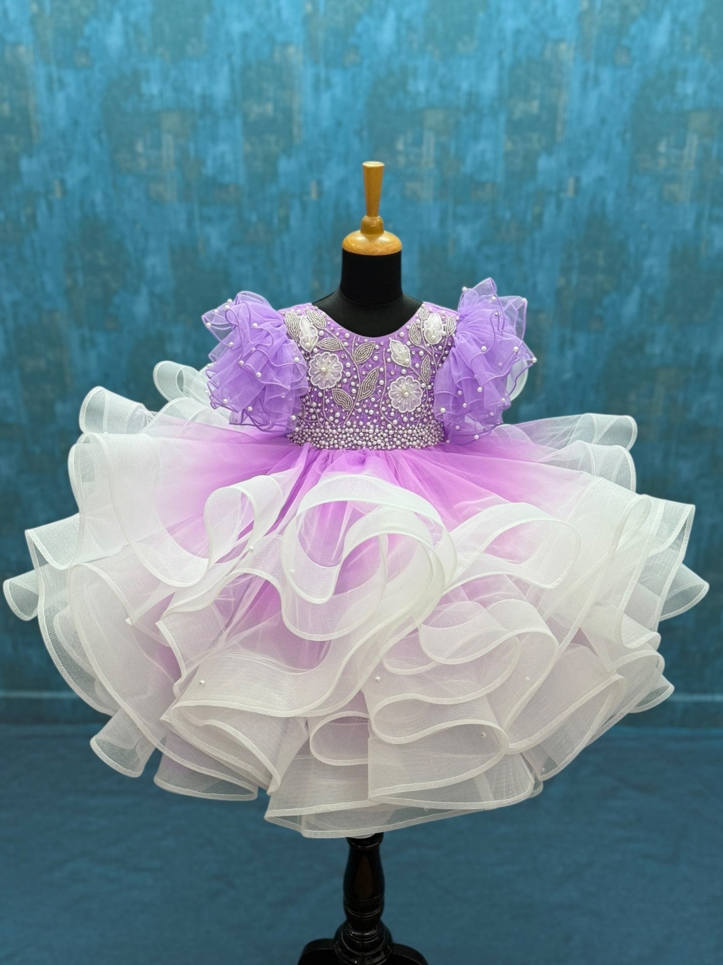 Lavender and white ombré pearl whirl gown with intricate floral embroidery