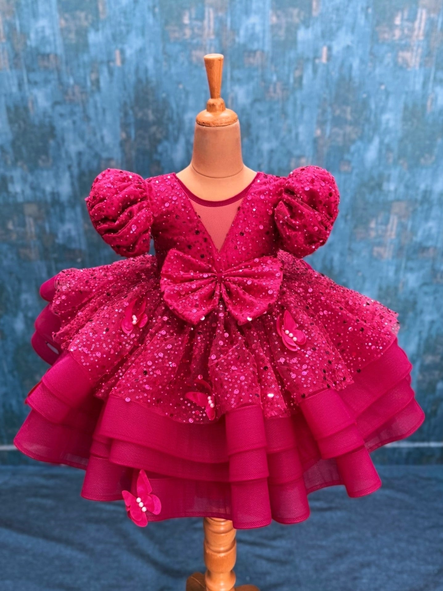 pink sequence layer gown with puff sleeves