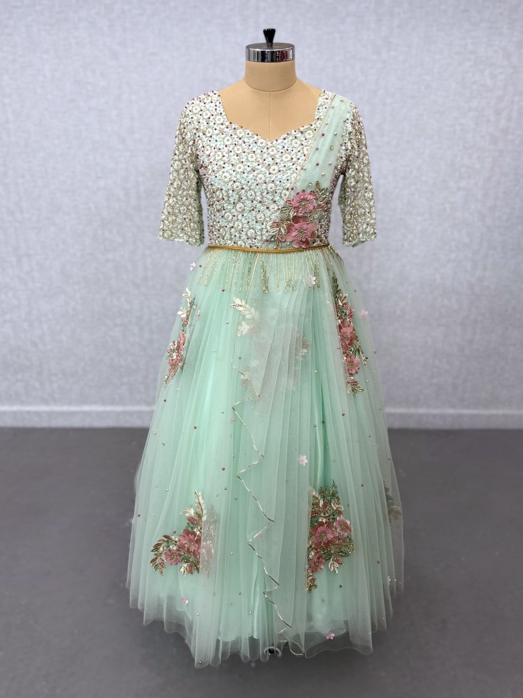 Floral gown with intricate work with attached draped dupatta