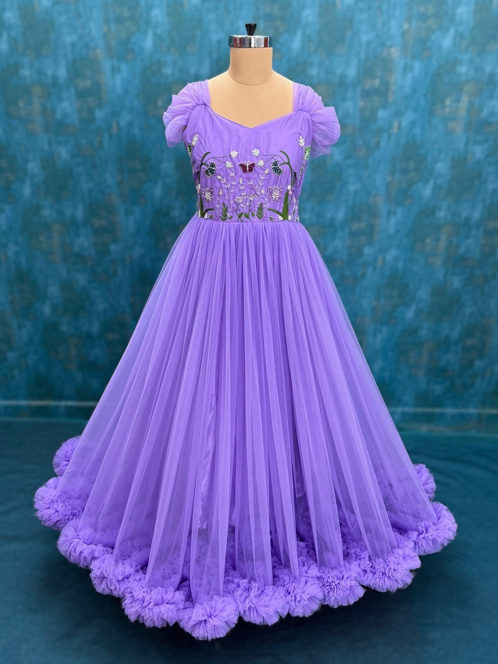 Floral and butterfly hand embroidered ruffle gown