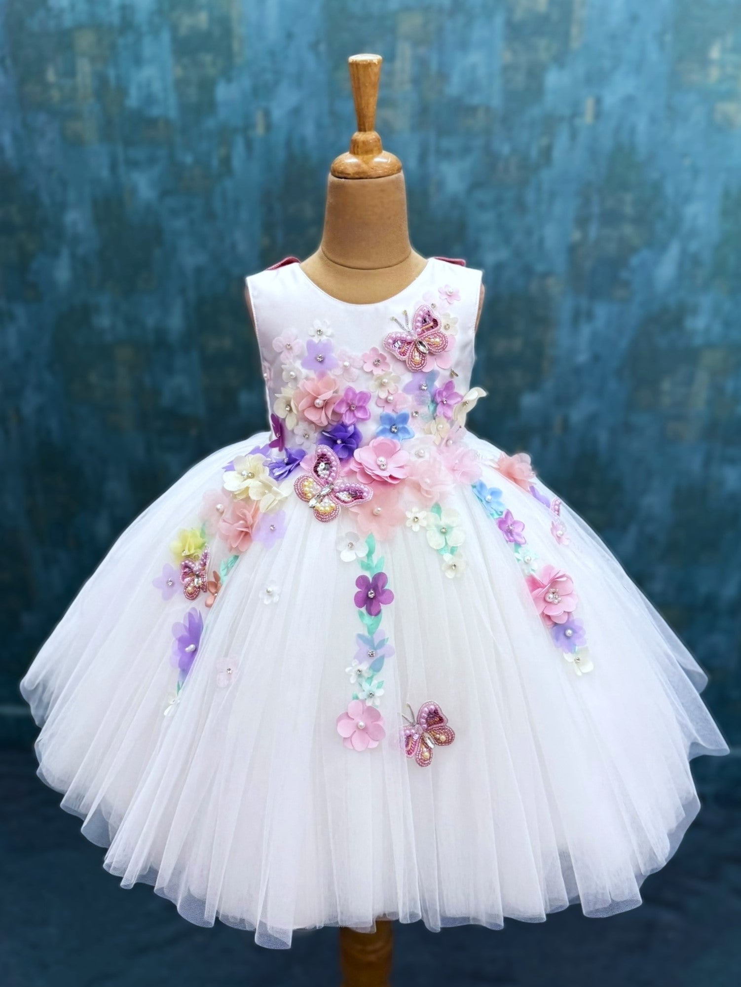 white floral and butterfly ball gown with intricate hand work