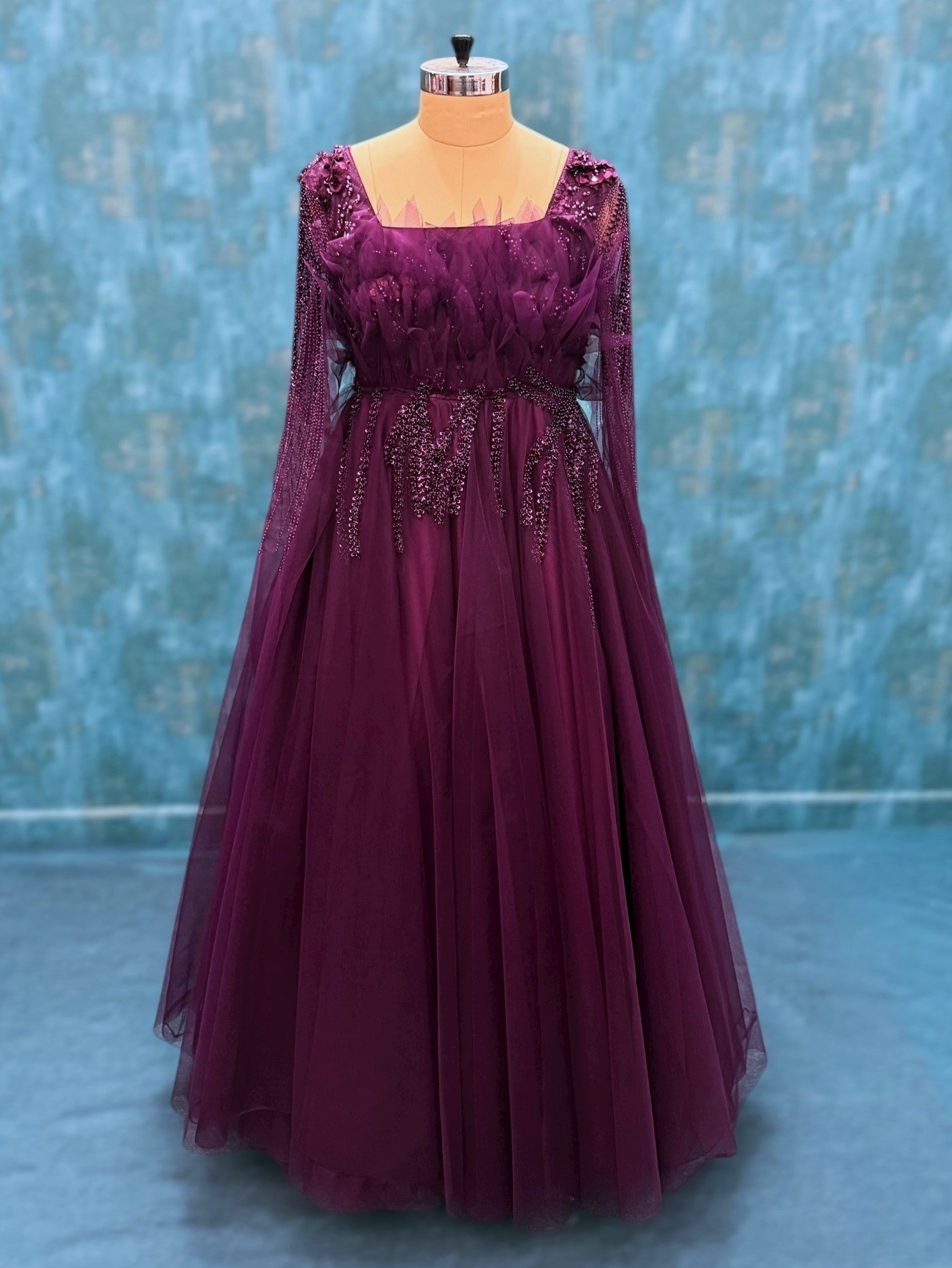Wine hand embroidered gown with flowing sleeves