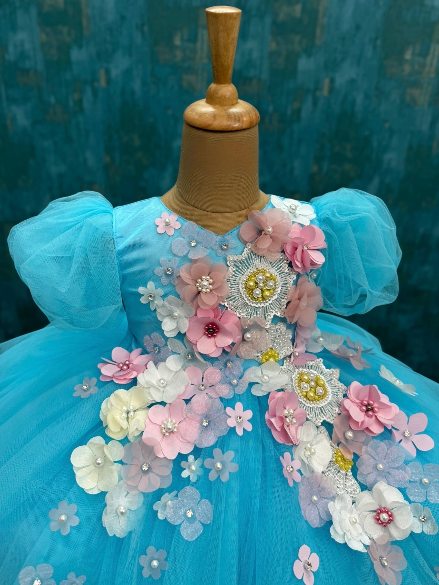 Blue floral and butterfly ball gown with intricate work