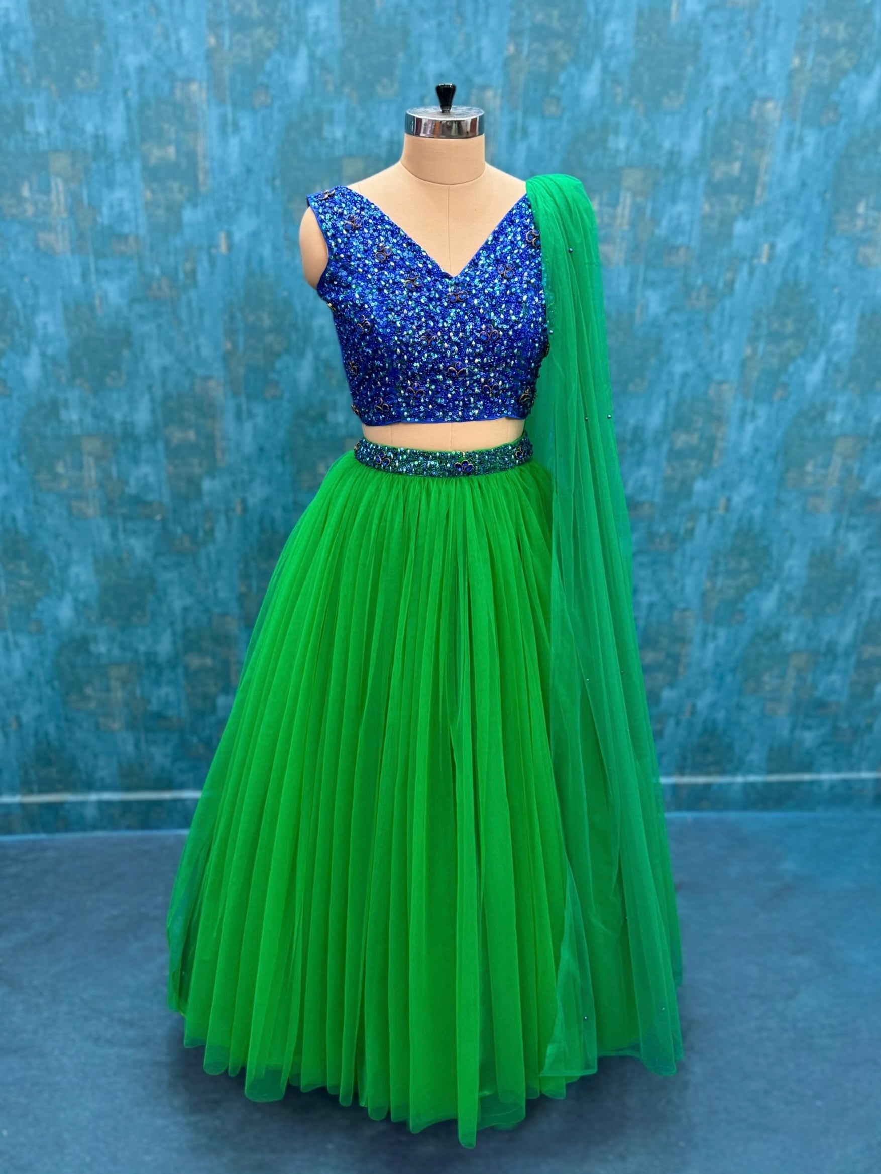 Peacock Crest Blue Crystal Majesty Emerald Flow Lehenga Ensemble With Dupatta