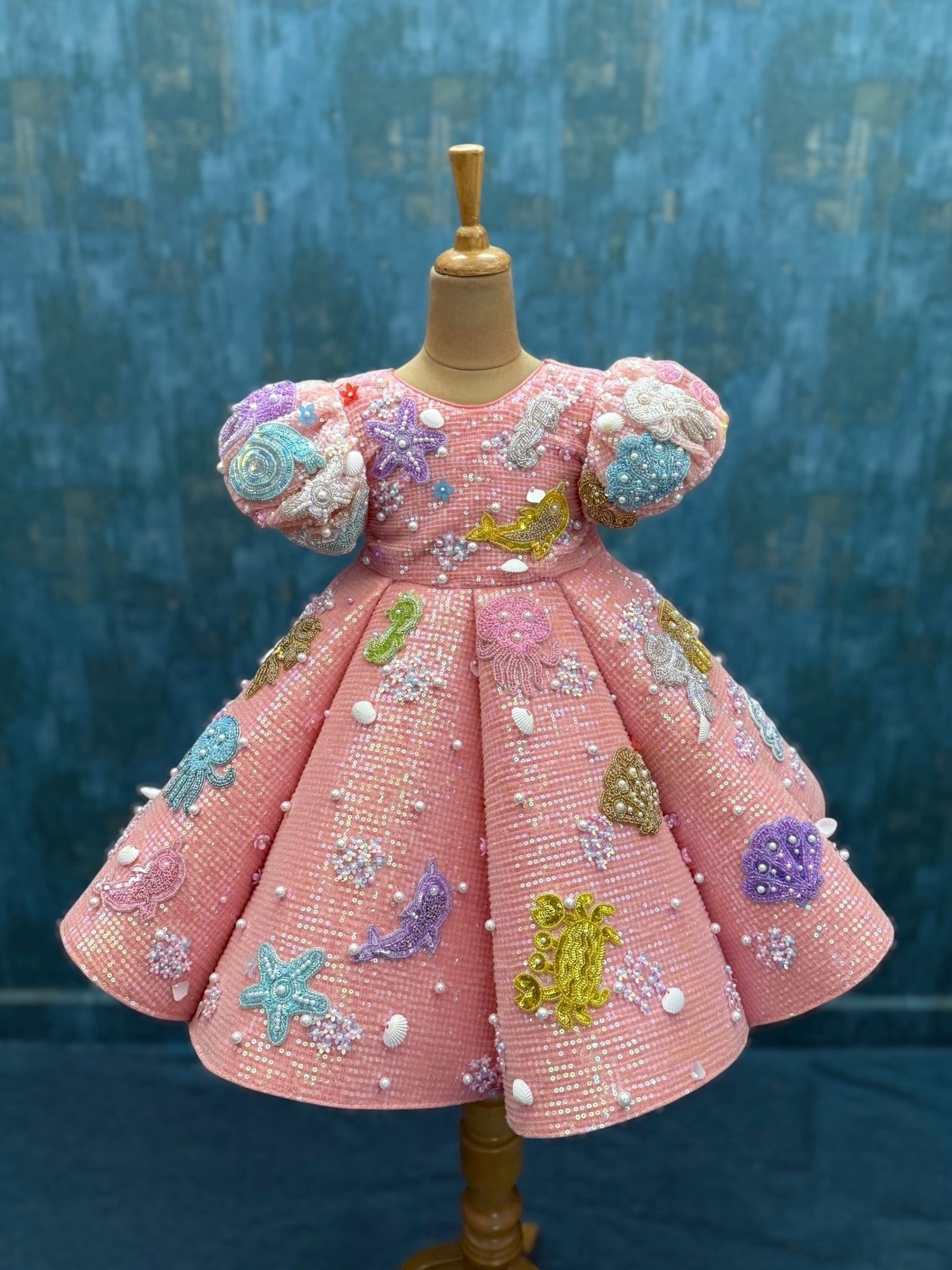 coral ocean theme panel gown with intricate hand work