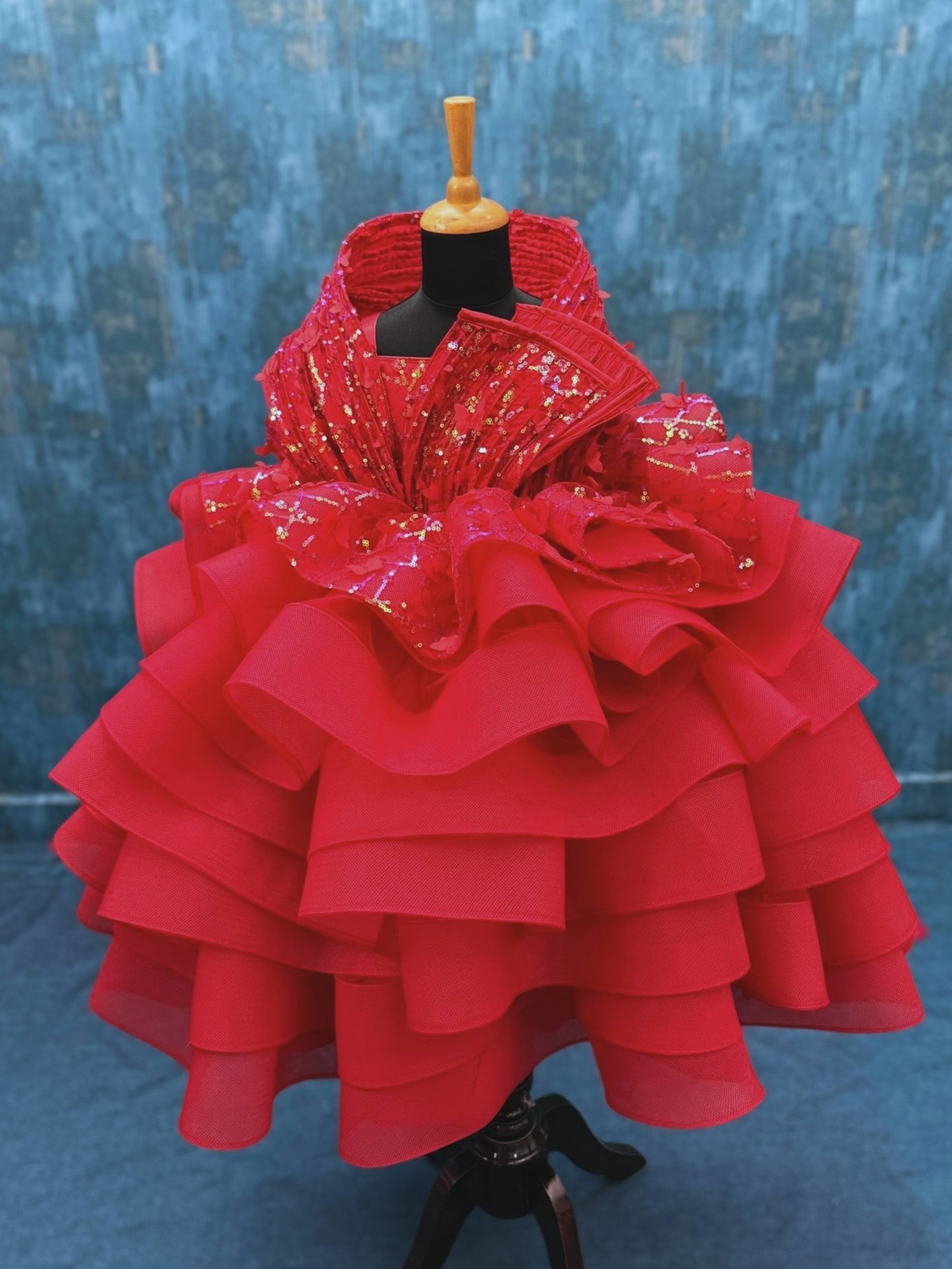 red layer butterfly gown with structured top