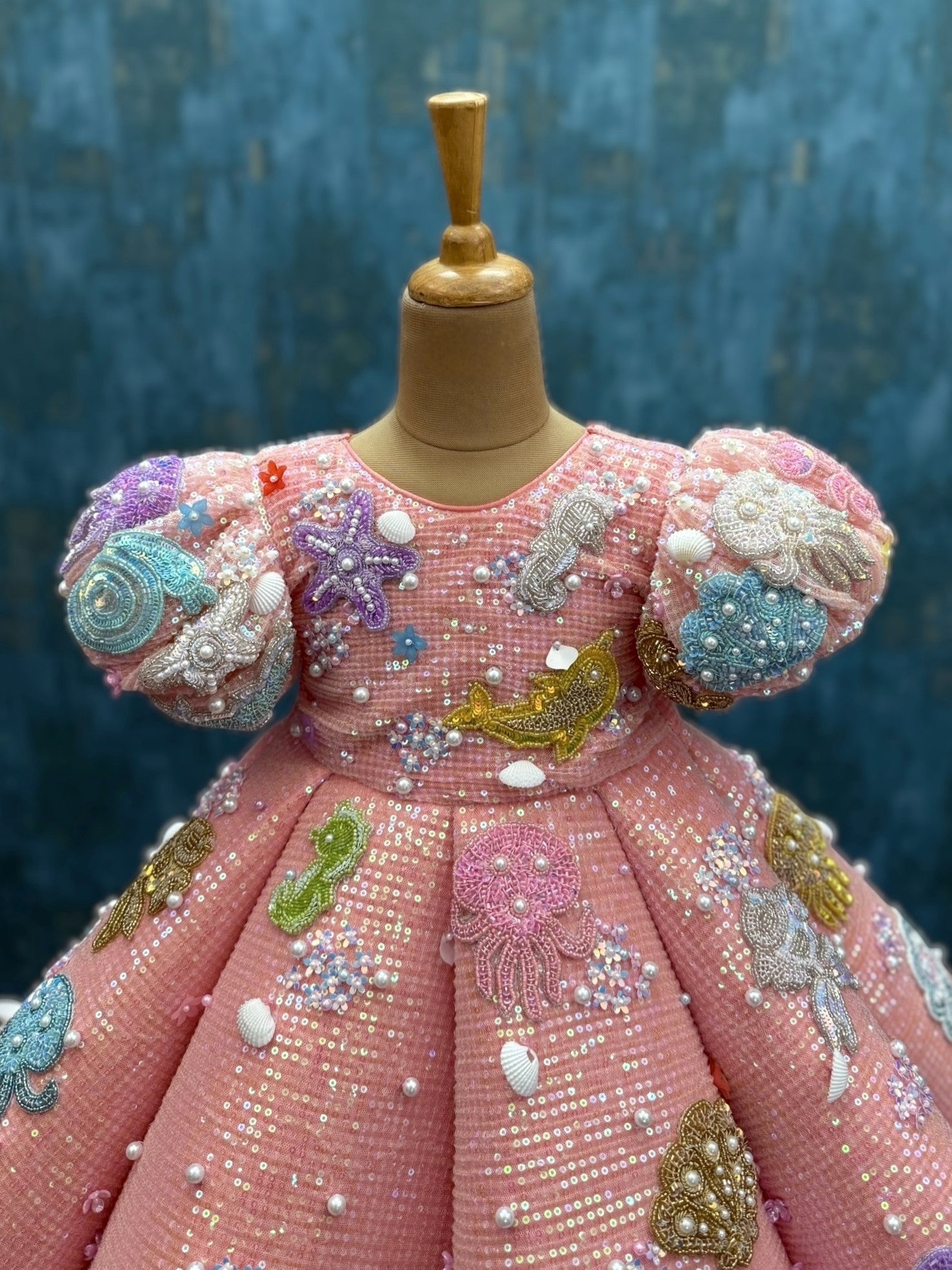 coral ocean theme panel gown with intricate hand work