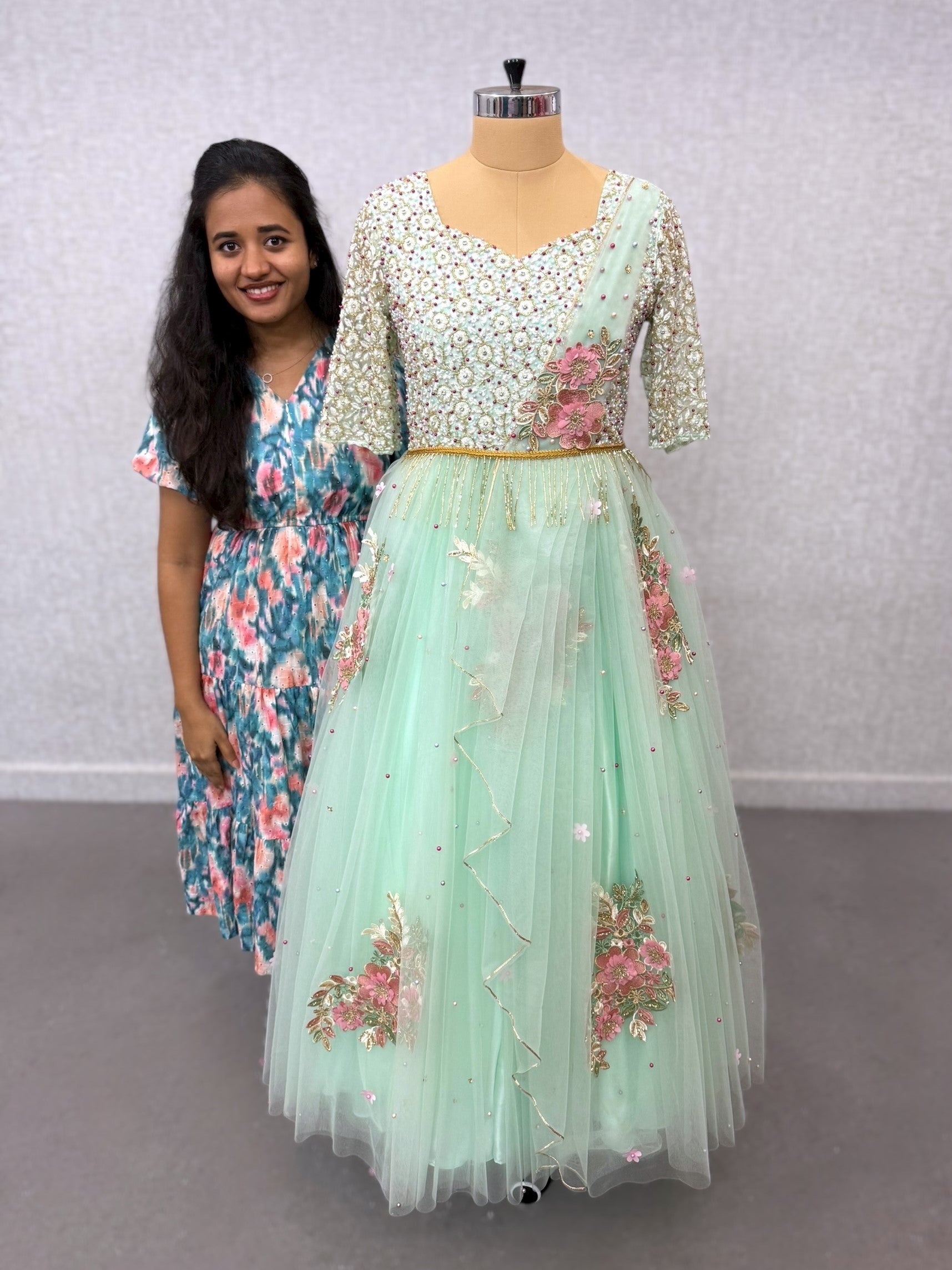 Floral gown with intricate work with attached draped dupatta