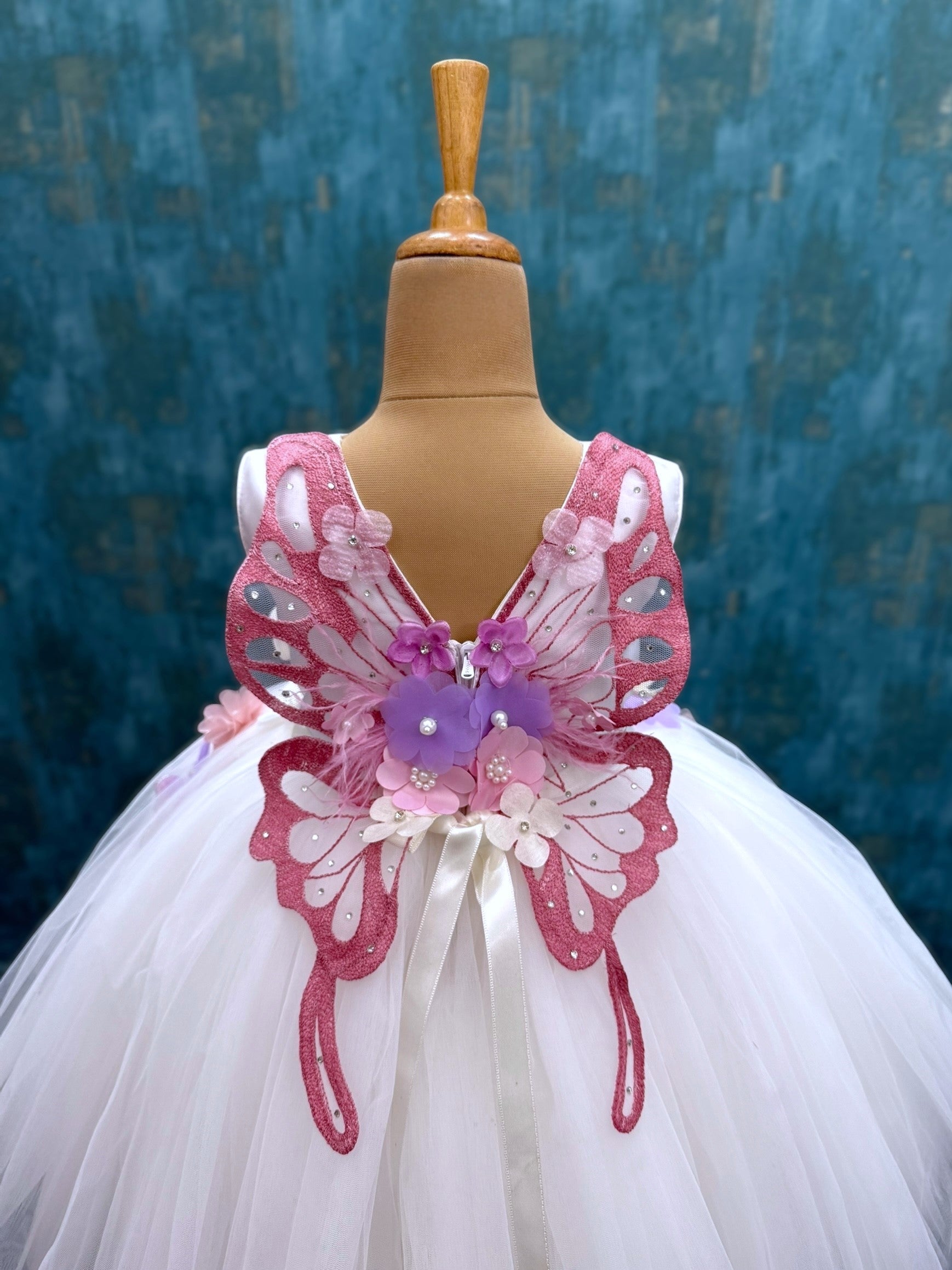 white floral and butterfly ball gown with intricate hand work