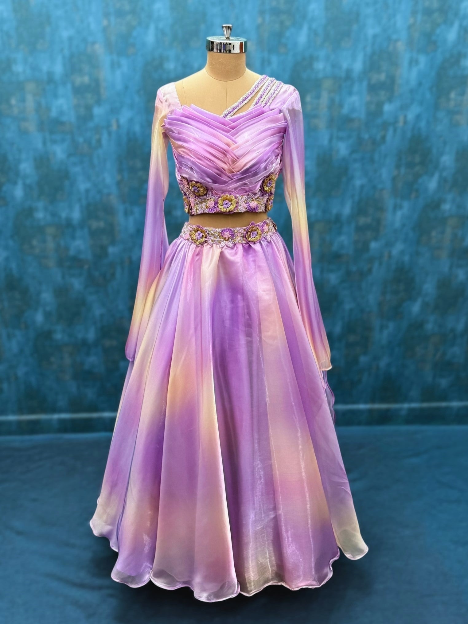 Draped hand embroidered lehenga with flowing sleeves