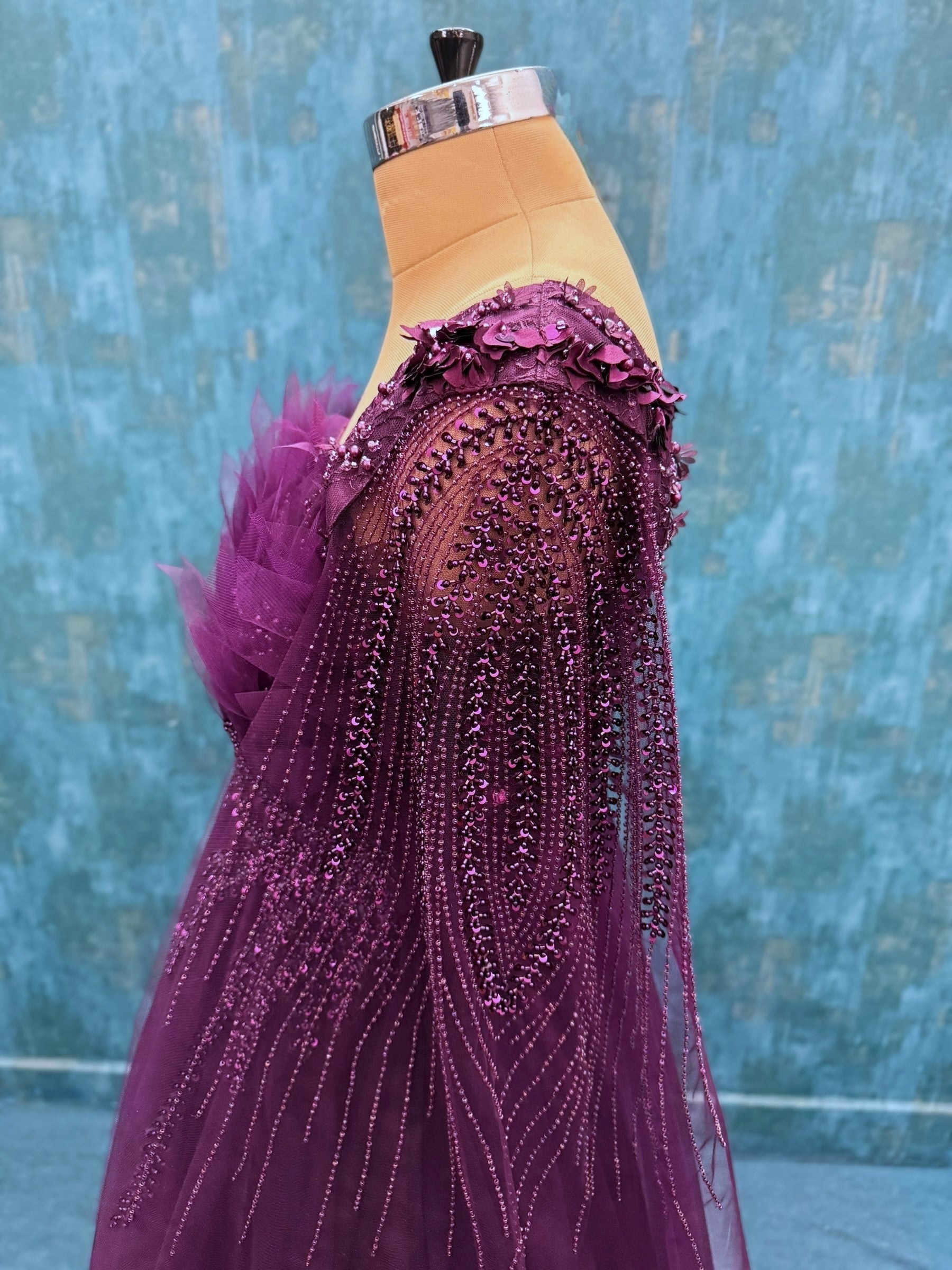 Wine hand embroidered gown with flowing sleeves