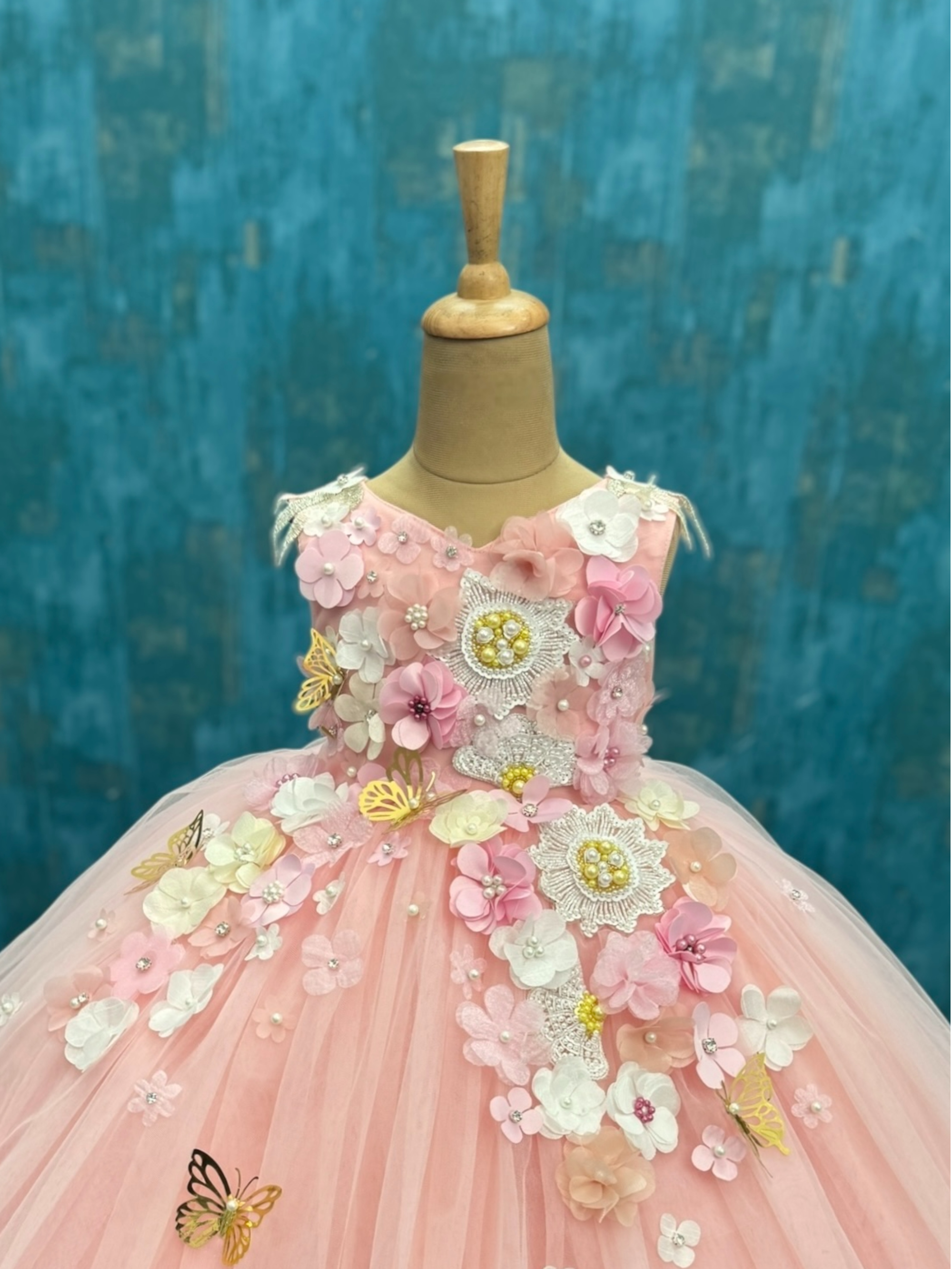 Soft Rose Pink floral and butterfly sleeveless ball gown with intricate work