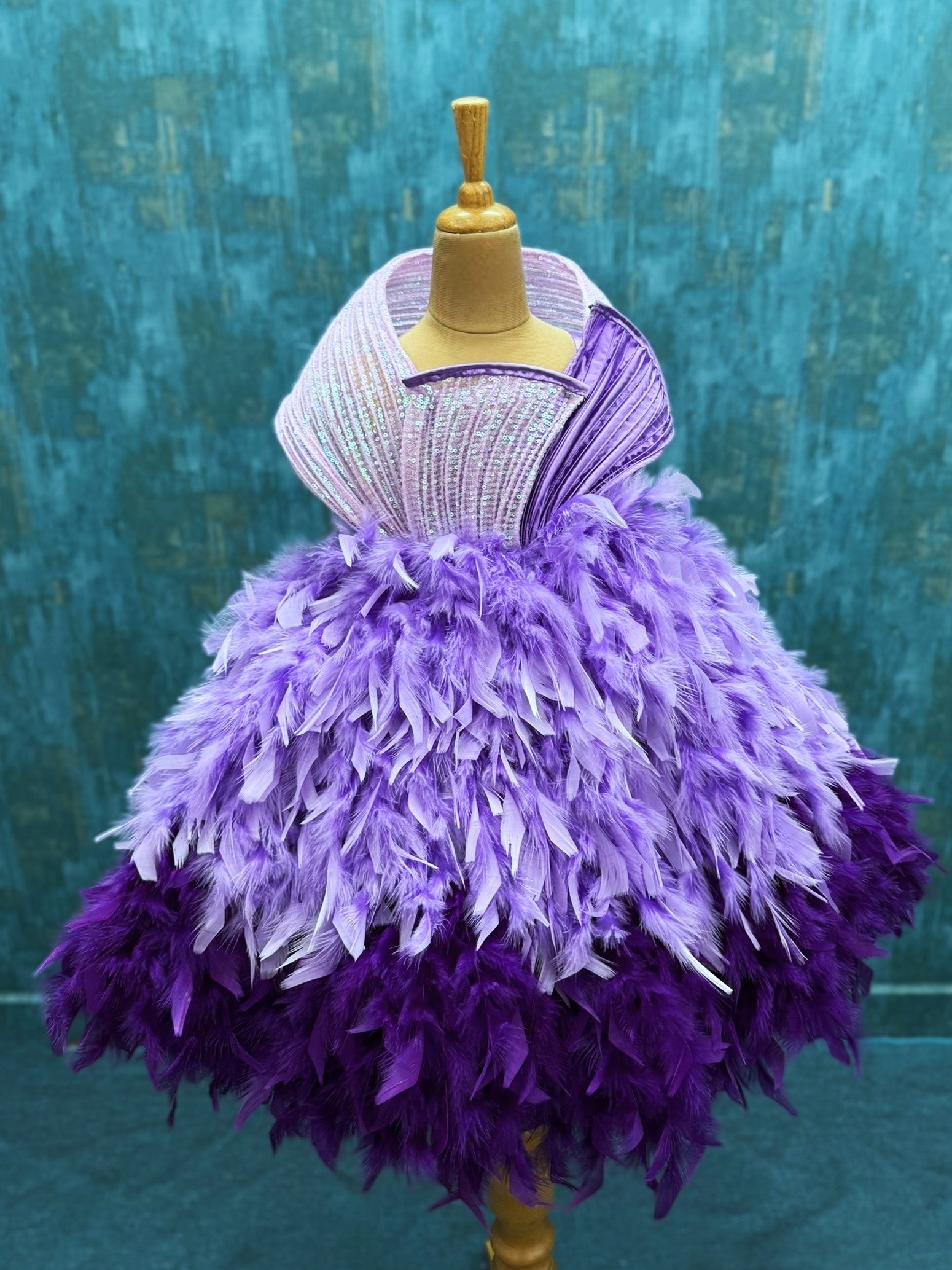 lavender and purple feather ball gown with sequenced structure top