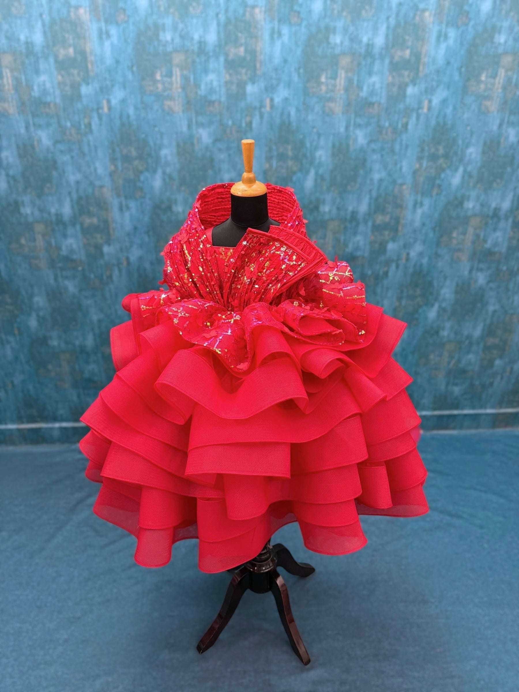 red layer butterfly gown with structured top