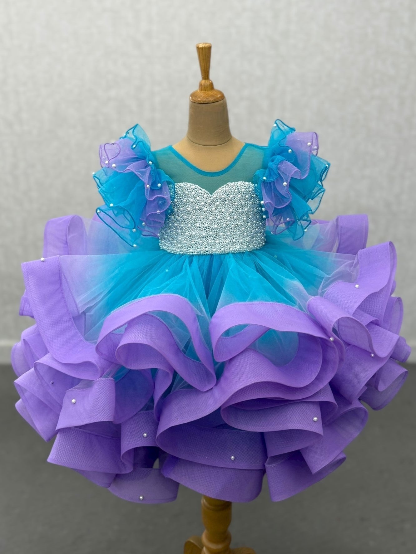 Enchanted blue and lavender – Fairy ruffle Ball Gown With intricate pearl work