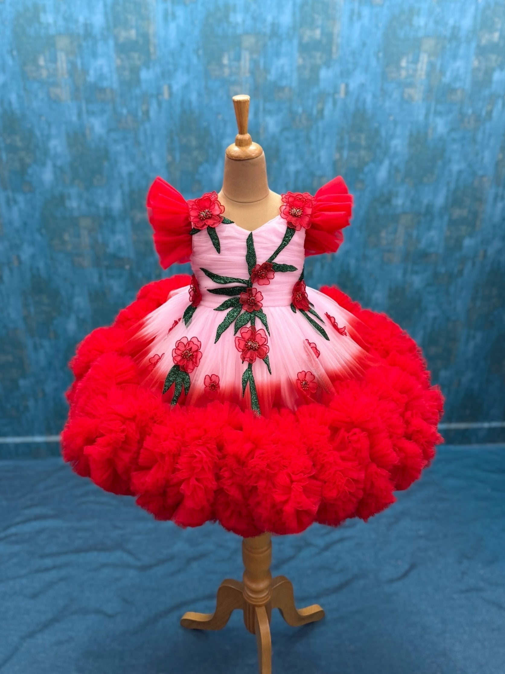 Peach And red double shade couture gown with hand crafted flowers and leaves