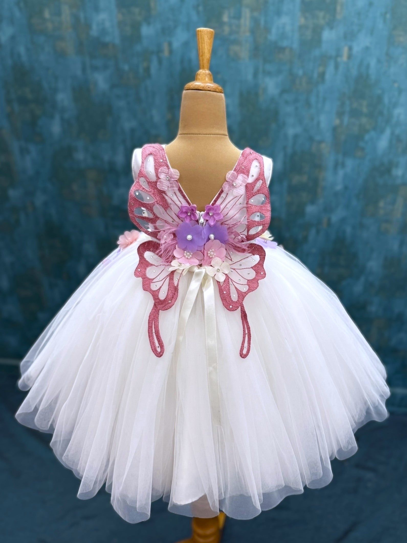 white floral and butterfly ball gown with intricate hand work