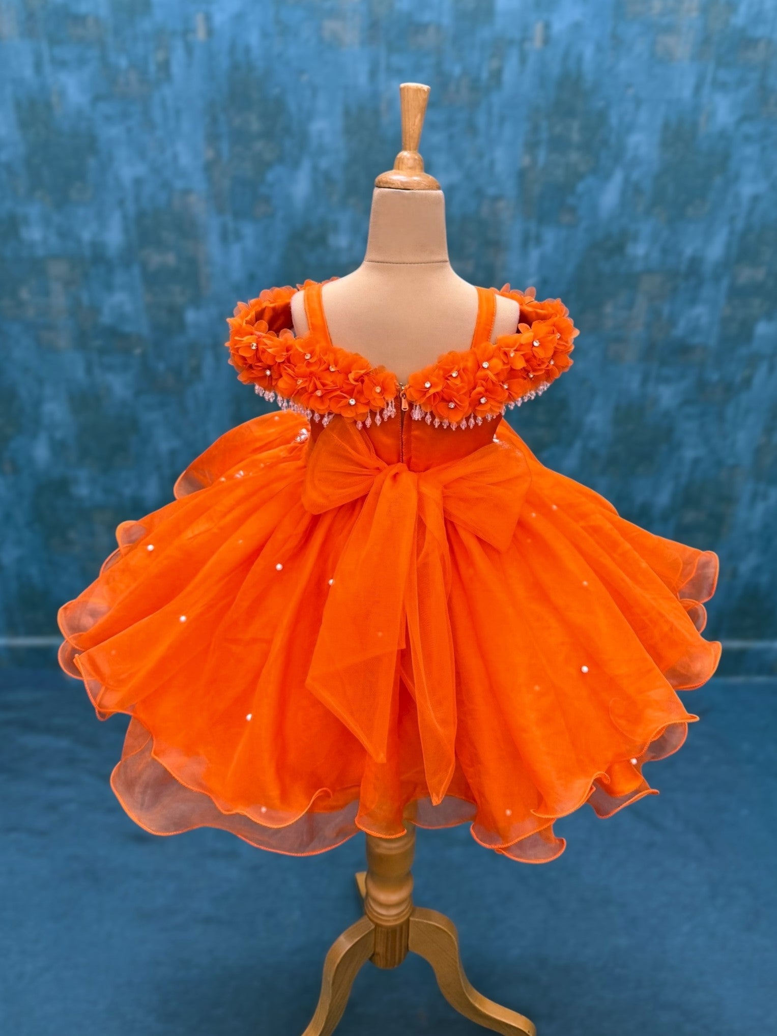 orange organza layer gown with intricate hand work