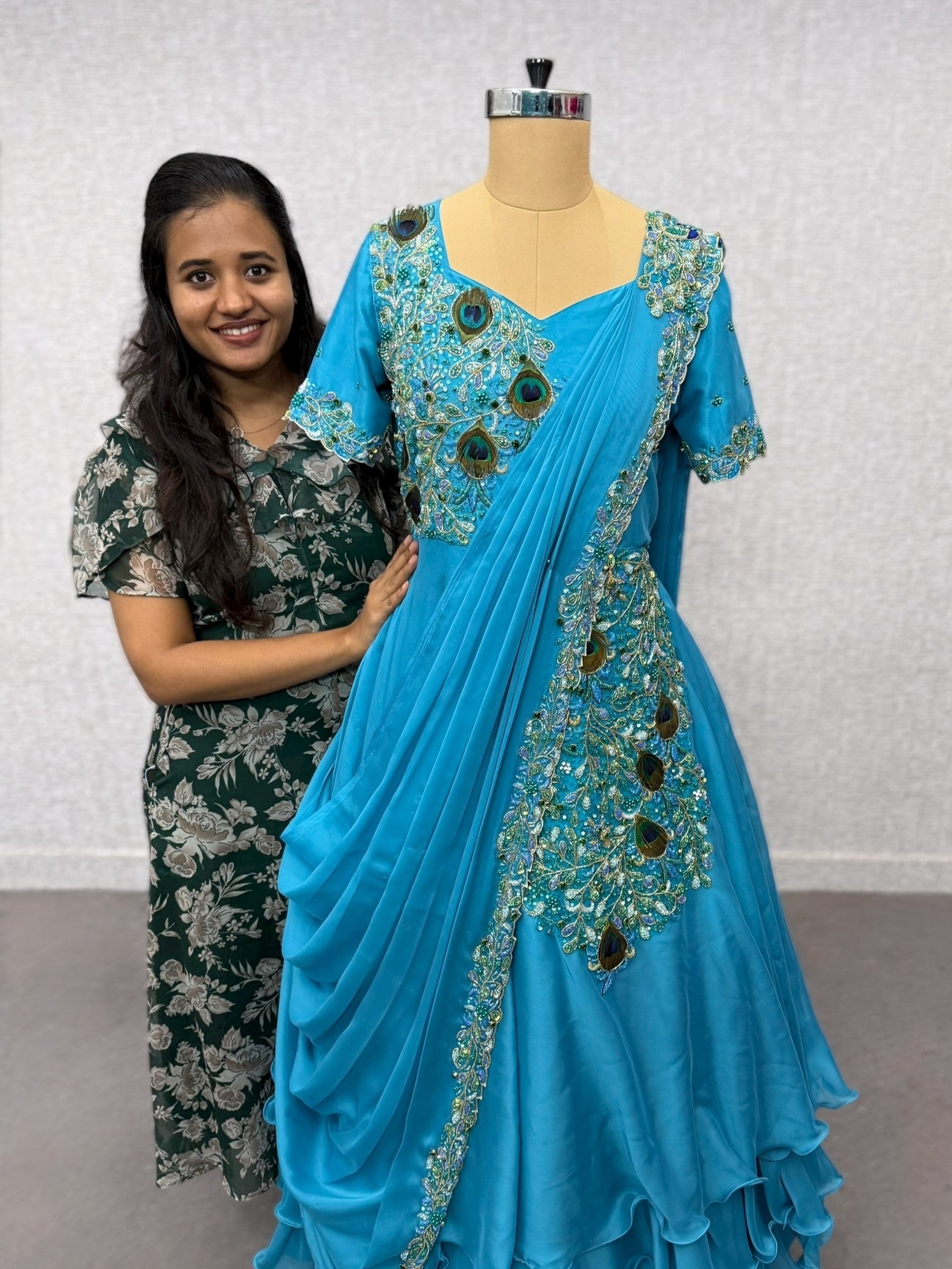 Peacock saree gown with draped dupatta and waist belt