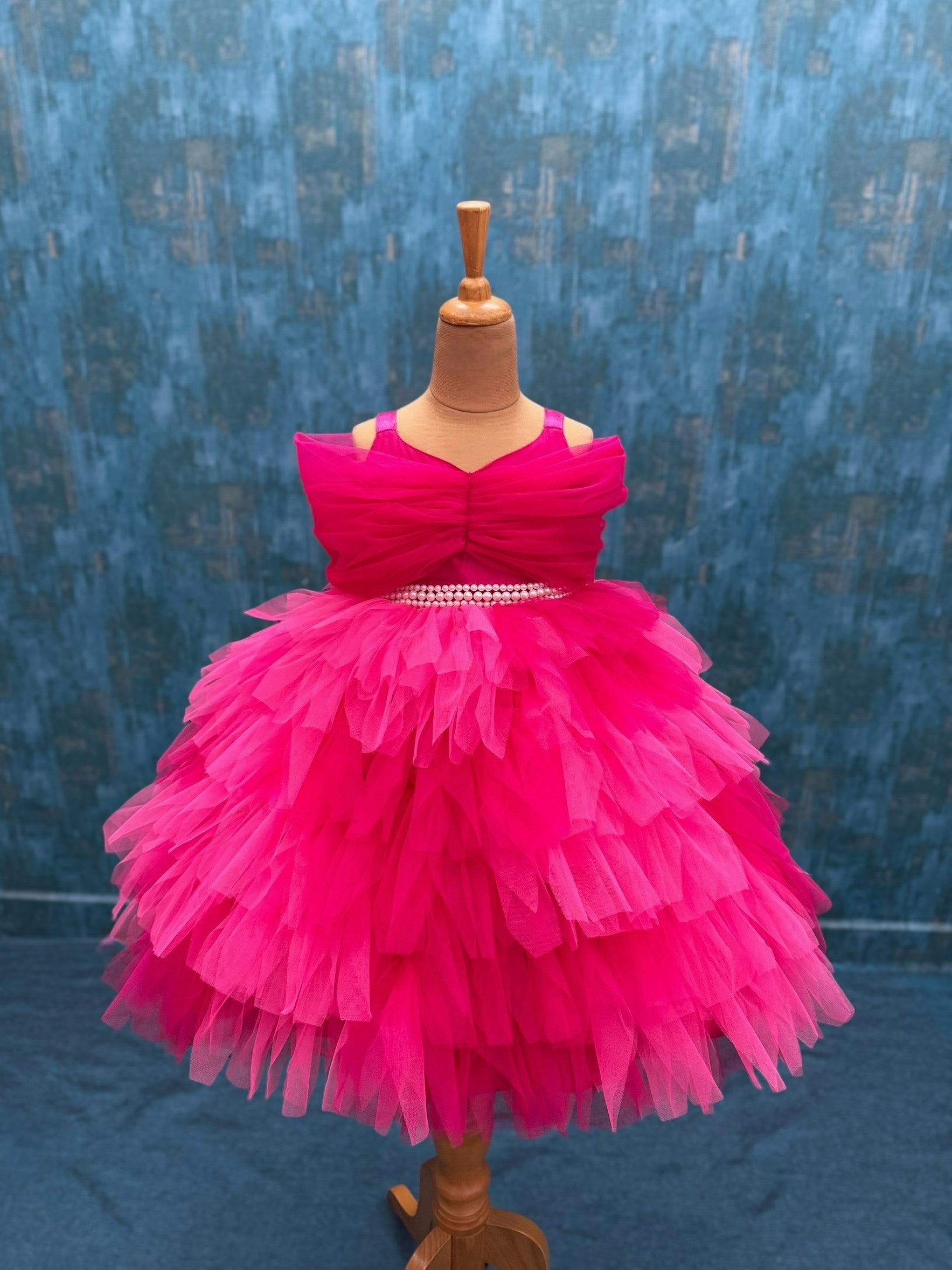 pink Berry Blush petal gown with overlapping sleeves