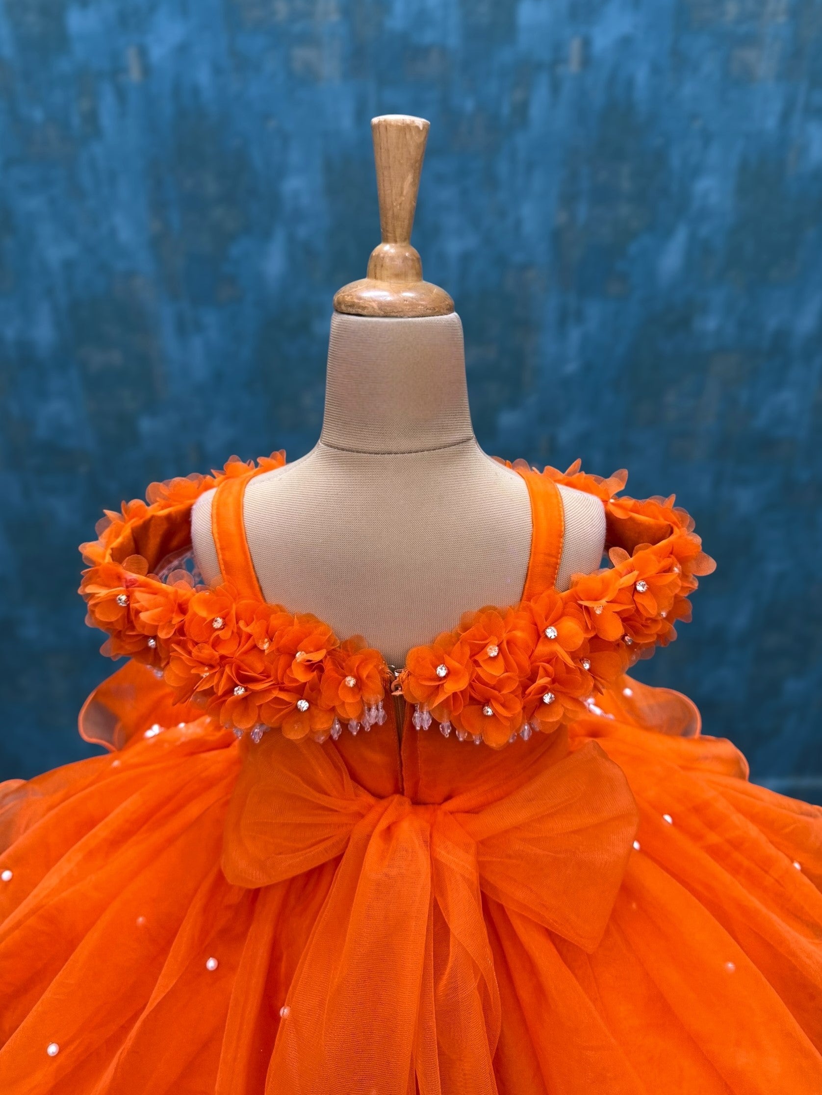 orange organza layer gown with intricate hand work