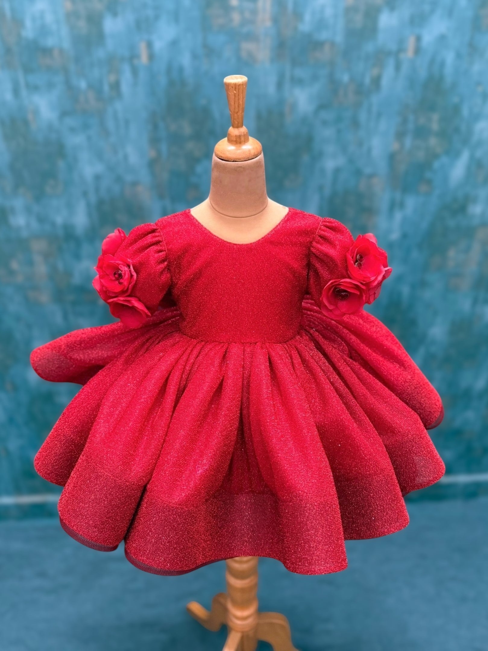 red shimmery floral gown with embossing flowers