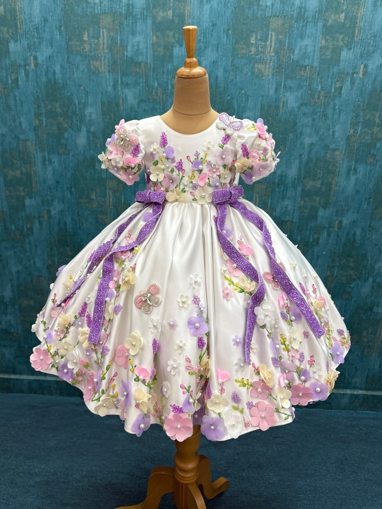 mind blowing white floral ball gown with attached trail with intricate hand work