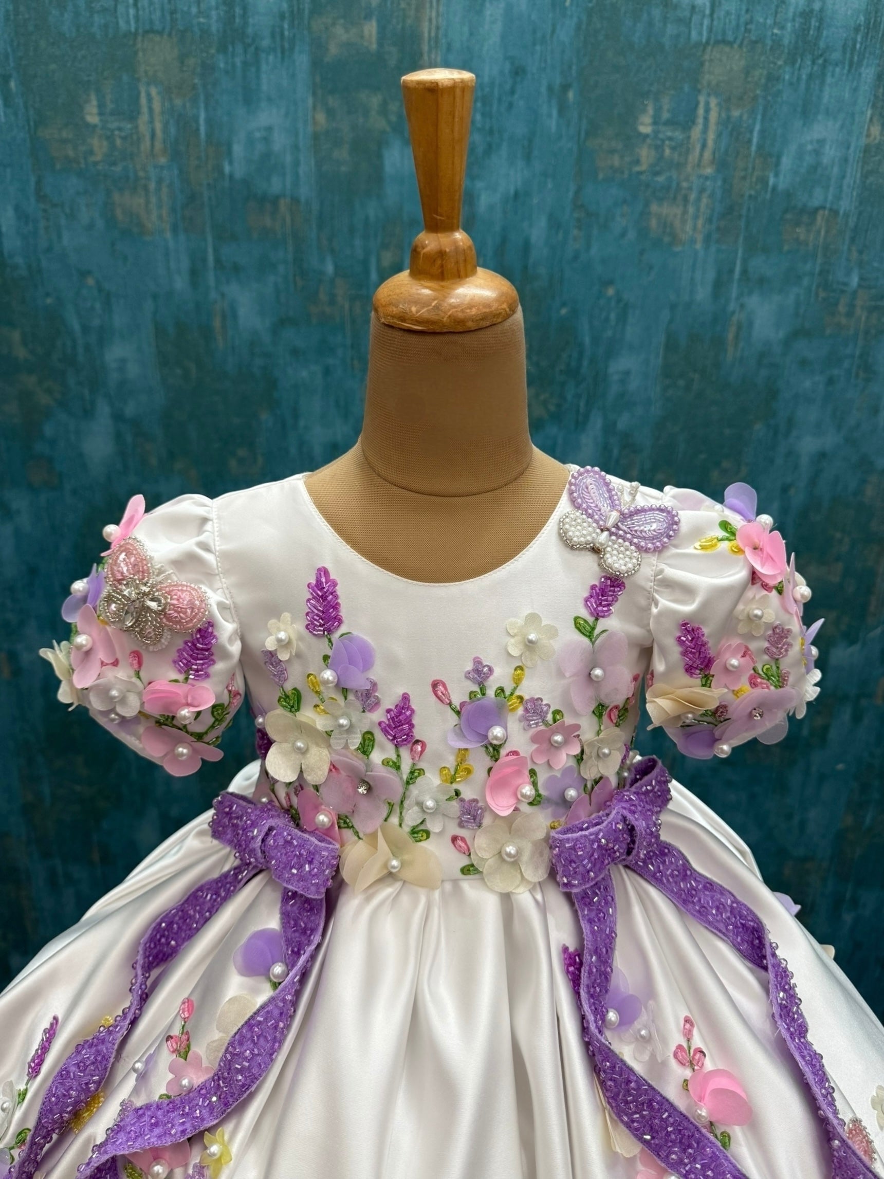 mind blowing white floral ball gown with attached trail with intricate hand work