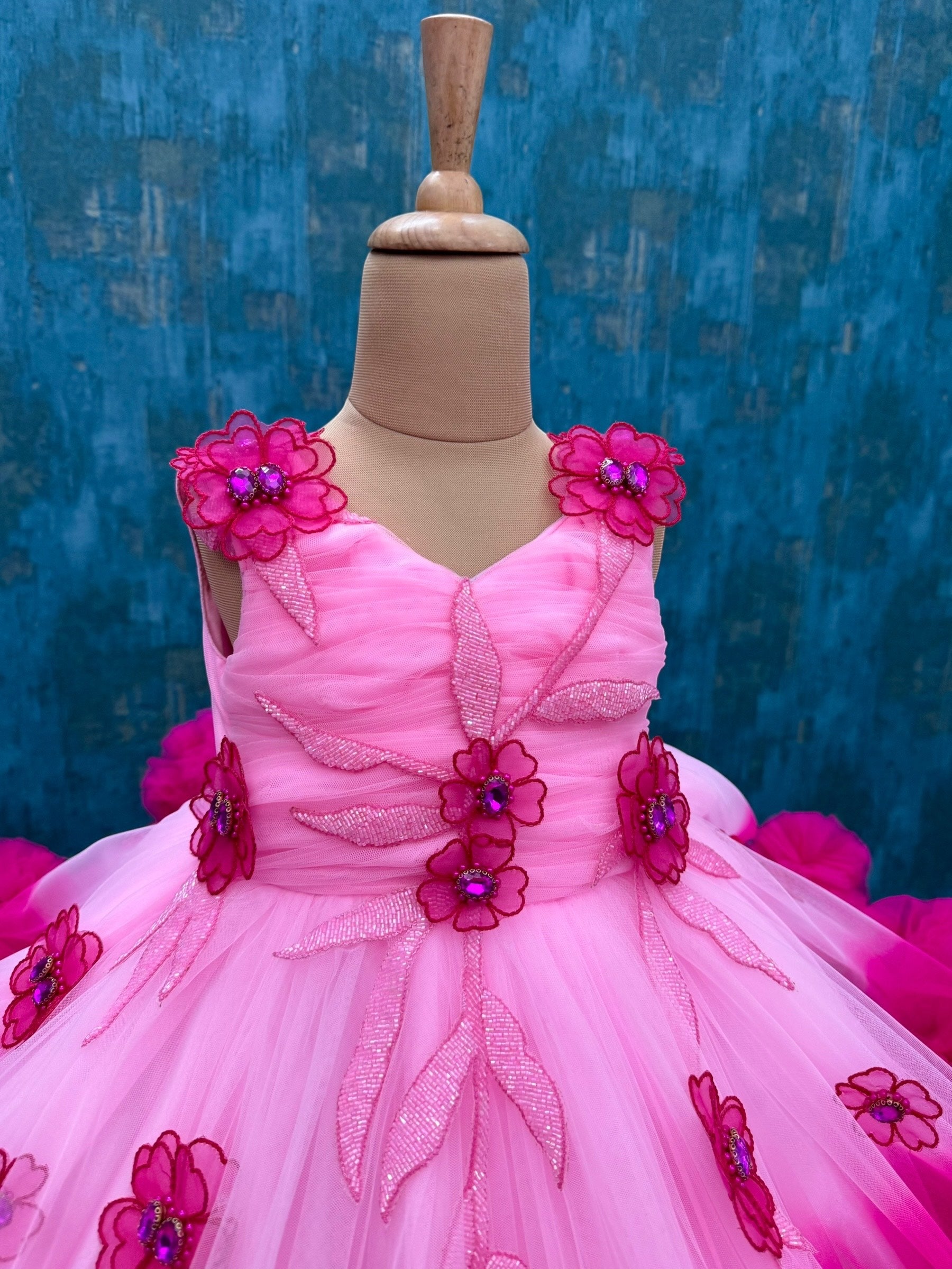 Baby pink and Fuchsia pink double shade couture gown with hand crafted flowers and leaves